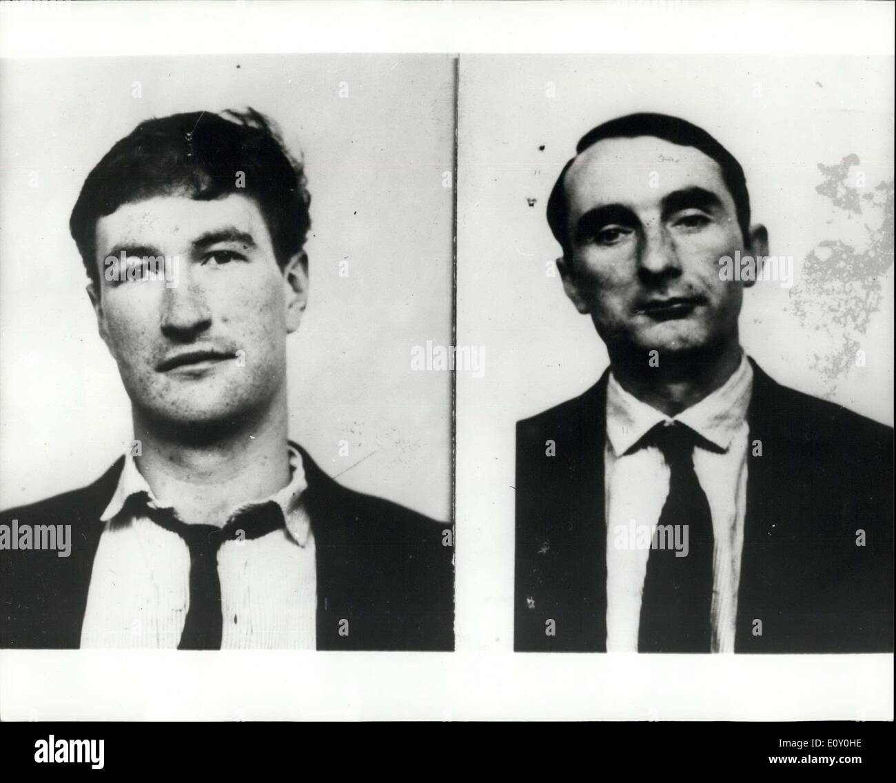 Feb. 14, 1968 - Scotland Yard Seek These Men: Scotland Yard last night issued photographs of two men police want to help their inquiries into the Fulham shooting of Terence '' Ba Ba'' Elgar, 22. He was shot dead in a house in Hazlebury Road, Fulham, on Saturday. Chief Superintendent William Bailey, the detective heading the investigation, said : ''We don't want the men tackling these men as they may be dangerous.'' The men are named as: George Edward Marshall, 33, 5ft. 8ins. slim build, dark brown hair, with the tip of his second right finger amputated; and Ian Horton, 26, 6ft. 1in Stock Photo