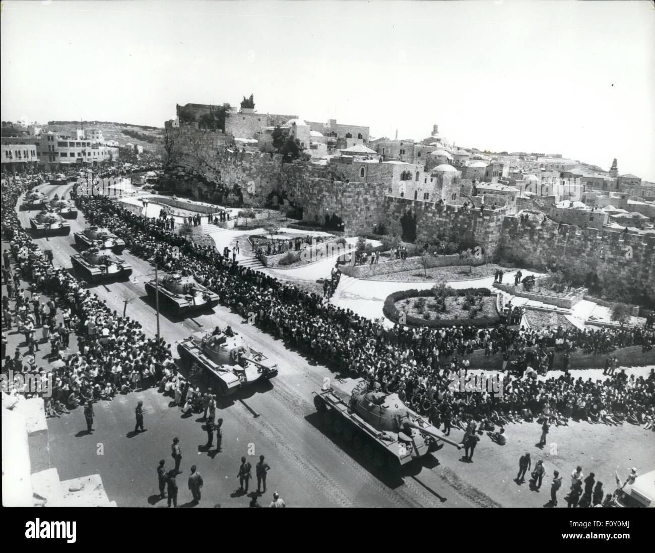 May 05, 1968 - Israel celebrates 20th anniversary of its independence with military parade: Israel celebrated its 20 year of Independence with a big military parade through the street of Jerusalem. Photo Shows A general view during the parade showing Pattom tanks taking part in the parade in the background is the Eastern side of old Jerusalem. Stock Photo
