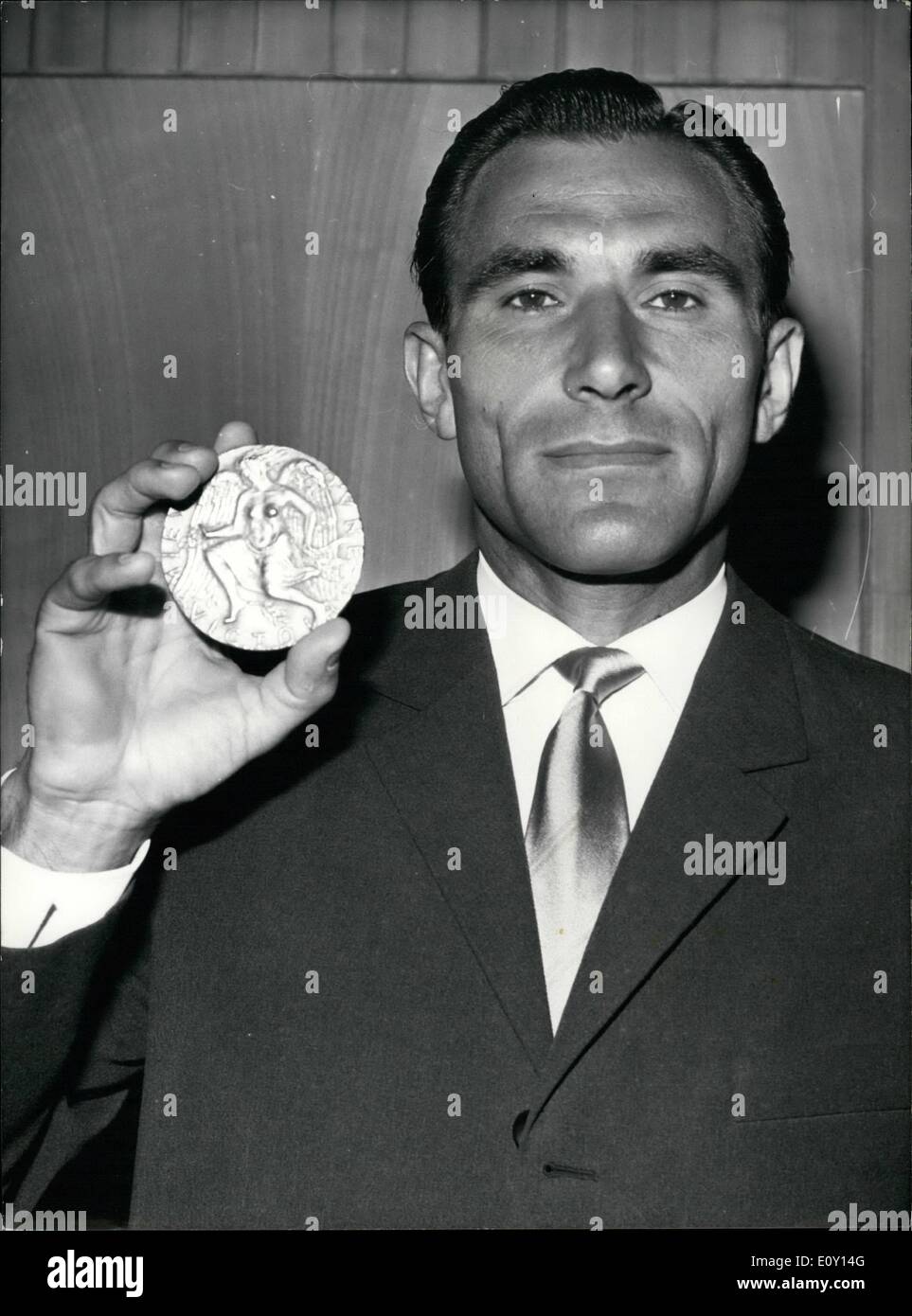 May 05, 1968 - Hungarian Tennis Champion Awarded Fair Play Trophy: M. Maheu, Director General of Unesco, handed the International National Fair play Pierre De Coubertin Trophy to Hungarian Tennis Champion Istvan Gulya's for his perfect and gentlemanly  during the Hamburg Championships. Istvan Gulyas showing his trophy. Stock Photo