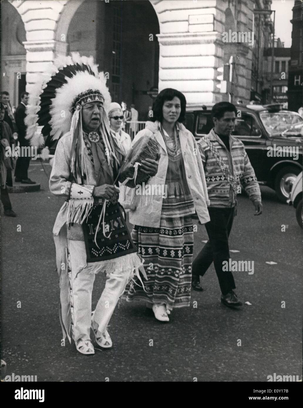 Mar. 03, 1968 - Party of Indians in London on Goodwill visit: Three members of the party of sic Indians who are here for three weeks on a goodwill visit sponsored by the U.S Department of Commerce, were out in London today-in their national costume. the three are Chief Wolf Hunt, full chief of the Acoma Pueblo Indian Tribe. (From Tulsa, Oklahome); Chief Joe Dan Osceola, leader of the seminoles. Great-great grandson of Chief Osceola, famous war chief of the Seminoles when they fought the United States Stock Photo