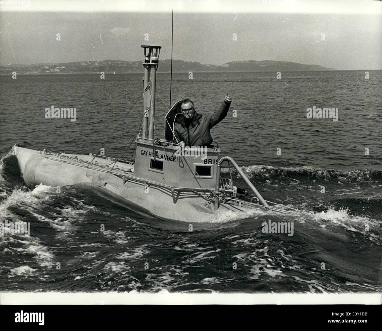 May 05, 1968 - He Hopes To Make Single-Handed Crossing of Atlantic In Submarine-Shaped Steel Cylinder. 52-year-old Douglas Price, of Temple Cloud, Somerset, with his home-made submarine-shaped cylinder, Gay Highlander, 26ft. long, during trials at Torbay, Devon. The boat, which has passed the Board of Trade inspection, is powered by a converted lorry engine, and is registered at 1.32 tons. Mr. Price hopes to make an Atlantic single-handed crossing by the southern route in June in 40 days. Stock Photo