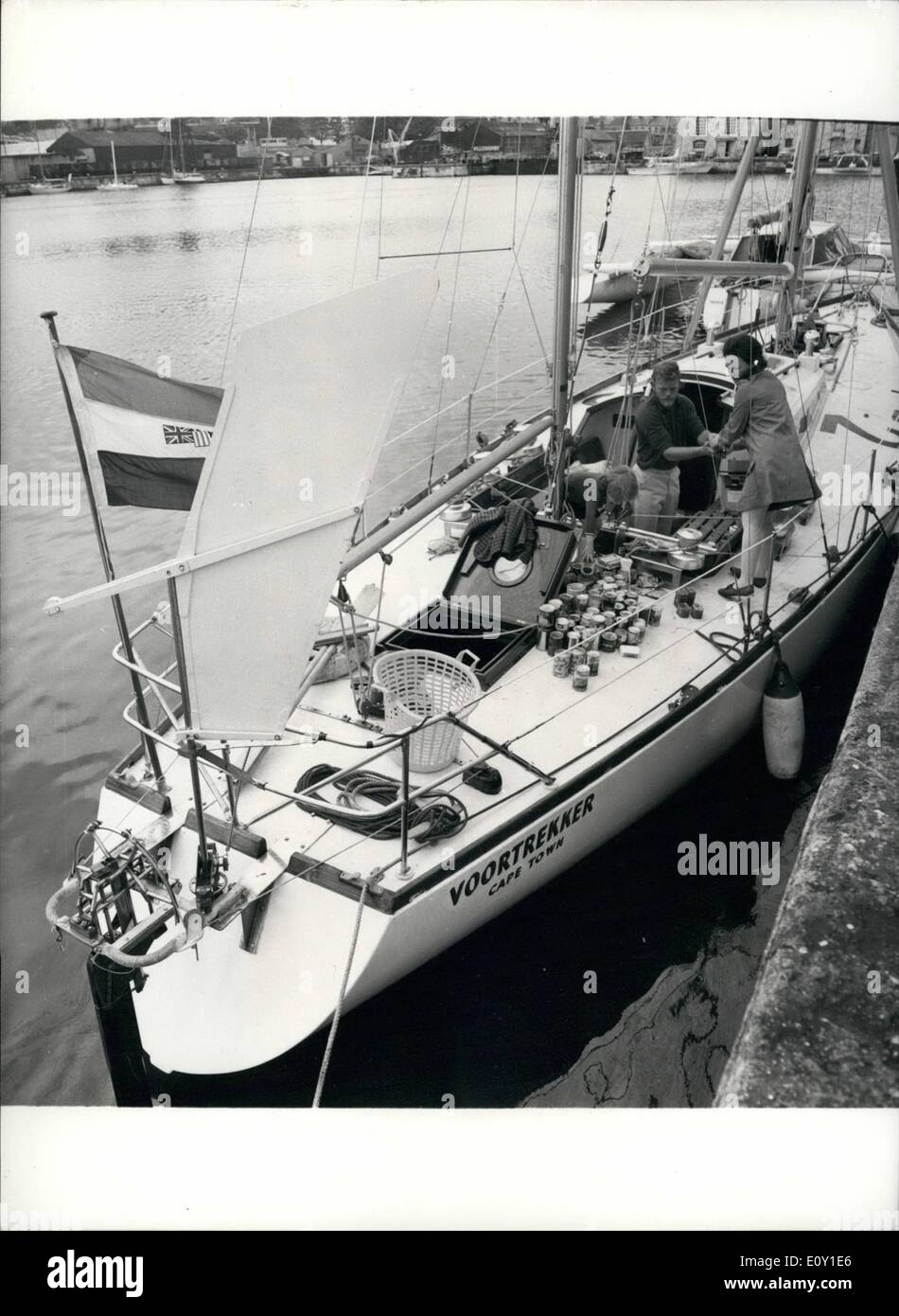 May 05, 1968 - Preparing to face the Atlantic Alone. On Saturday ( June 1 ), 43 yachts from 10 countries, with 3,000 miles of lonely Atlantic ahead of them - set out from Plymouth Single-handed for Newport, Rhode Island. Yesterday yachtsmen were stowing gear and stores in readiness for the start. Photo Shows The 50ft. Ketch Voortrekker, one of the favorites, from South Africa, was being victualled by Mr. Bruce Dalling, with the help of his sister, Mrs. Carole Charmier, and her daughter, Emmy. Stock Photo