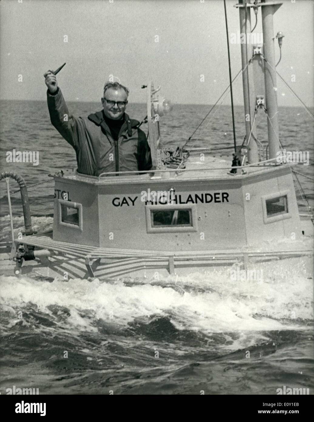 May 05, 1968 - He hopes to make single handed crossing of Atlantic in Submarine Shaped steel cylinder. 52 year old Douglas Price , of Temple Cloud, Somerset, with is home made submarine shaped cylinder , Gay Highlander, 26ft. long, during trials at Torbay, Devon. The boat , which has passed the Beard of Trade inspection , is powered by a converted lorry engine , and is registered at 1,32 tons. Mr. Price hopes to make an Atlantic single handed crossing by the southern route in June in 40 days. Stock Photo
