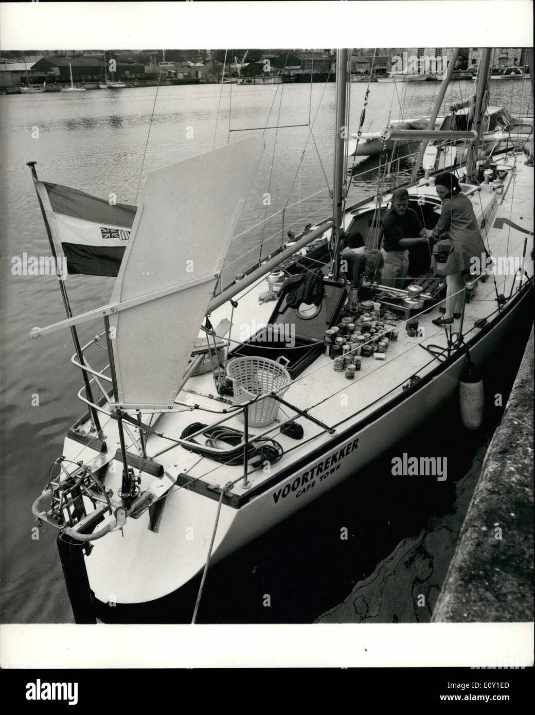 May 05, 1968 - Preparing to face the Atlantic Alone: On Saturday (June 1), 43 yachts from 10 countries, with 3,000 miles of lonely Atlantic ahead of them set out from Plymouth single-handed for Newport, Rhode Island. Yesterday yachtsmen were stowing gear and stores in readiness for the start. Photo shows the 50 ft. ketch Voortrekker, one of the favourites, from South Africa, was being victualled by Mr. Bruce Dalling, with the help of his sister, Mrs. Carols Charmier, and her daughter, Emmy. Stock Photo