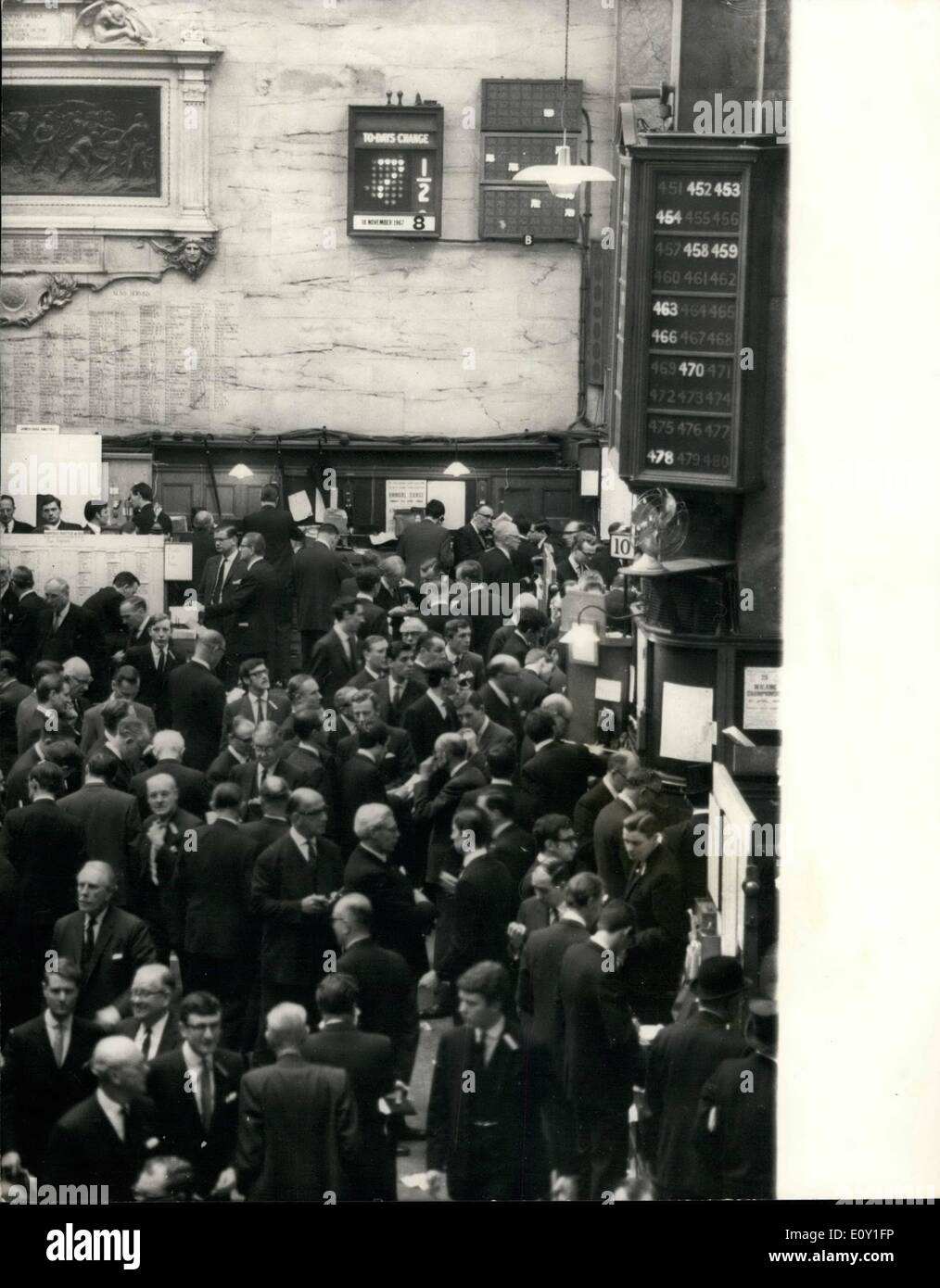 Mar. 03, 1968 - Bank Rate Down to 7 1/2 %  Photo Shows: The busy scene inside the Stock Exchange after today's Bank Rate Stock Photo
