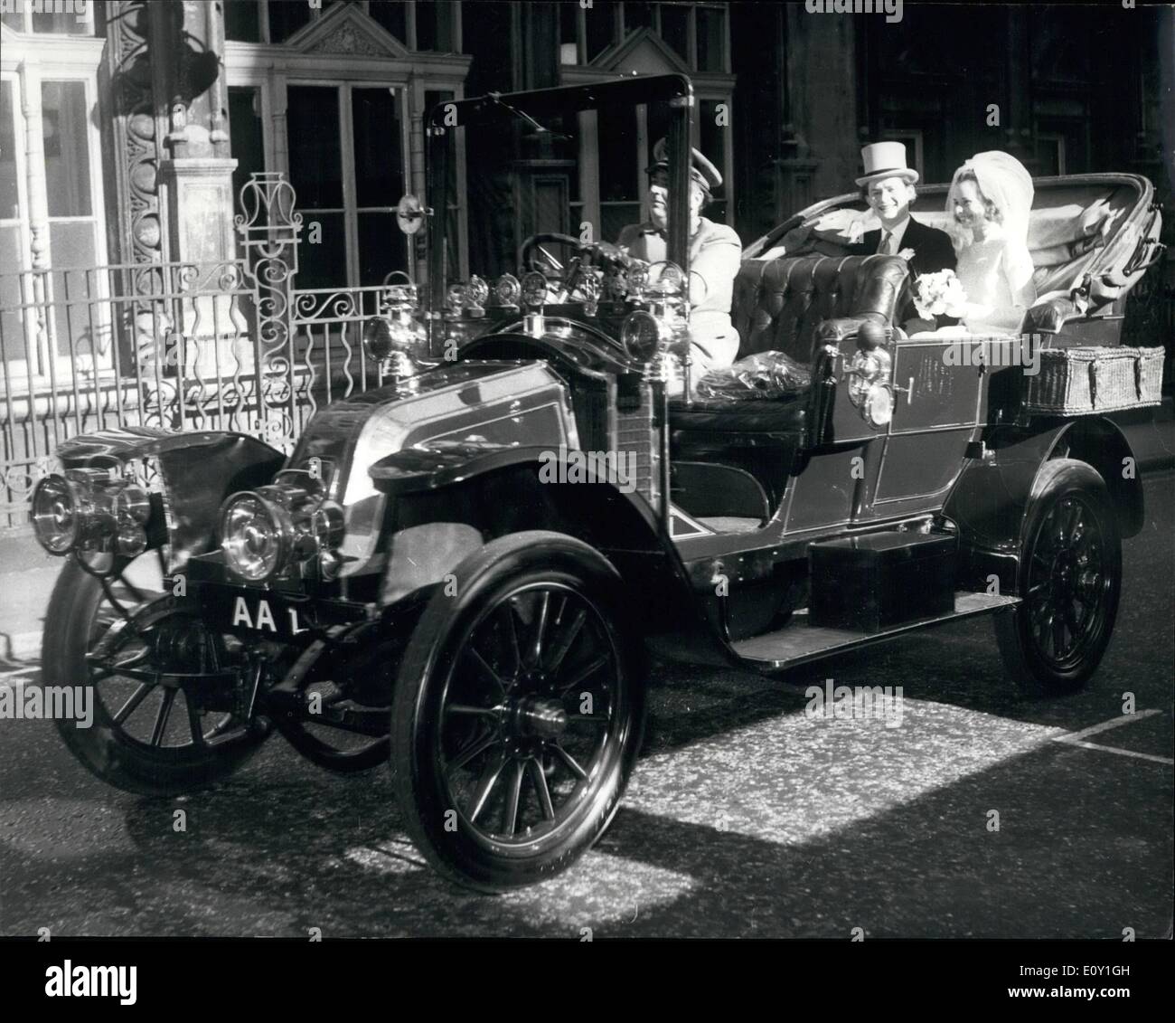 Mar. 03, 1968 - Veteran Car At AA Wedding: The Automobile Association's 1904 Renault car was an appropriate wedding carriage for the AA director general's only daughter, Miss Juliet Durie, 26, and Mr. John Grenville Napier, 29,m son of the later Lt, Col. Lord Napier and Patrick. After their marriage yesterday at St; Jame's Piccadilly, the couple were driven in it to a reception at Quaglino's Bury Street. Stock Photo