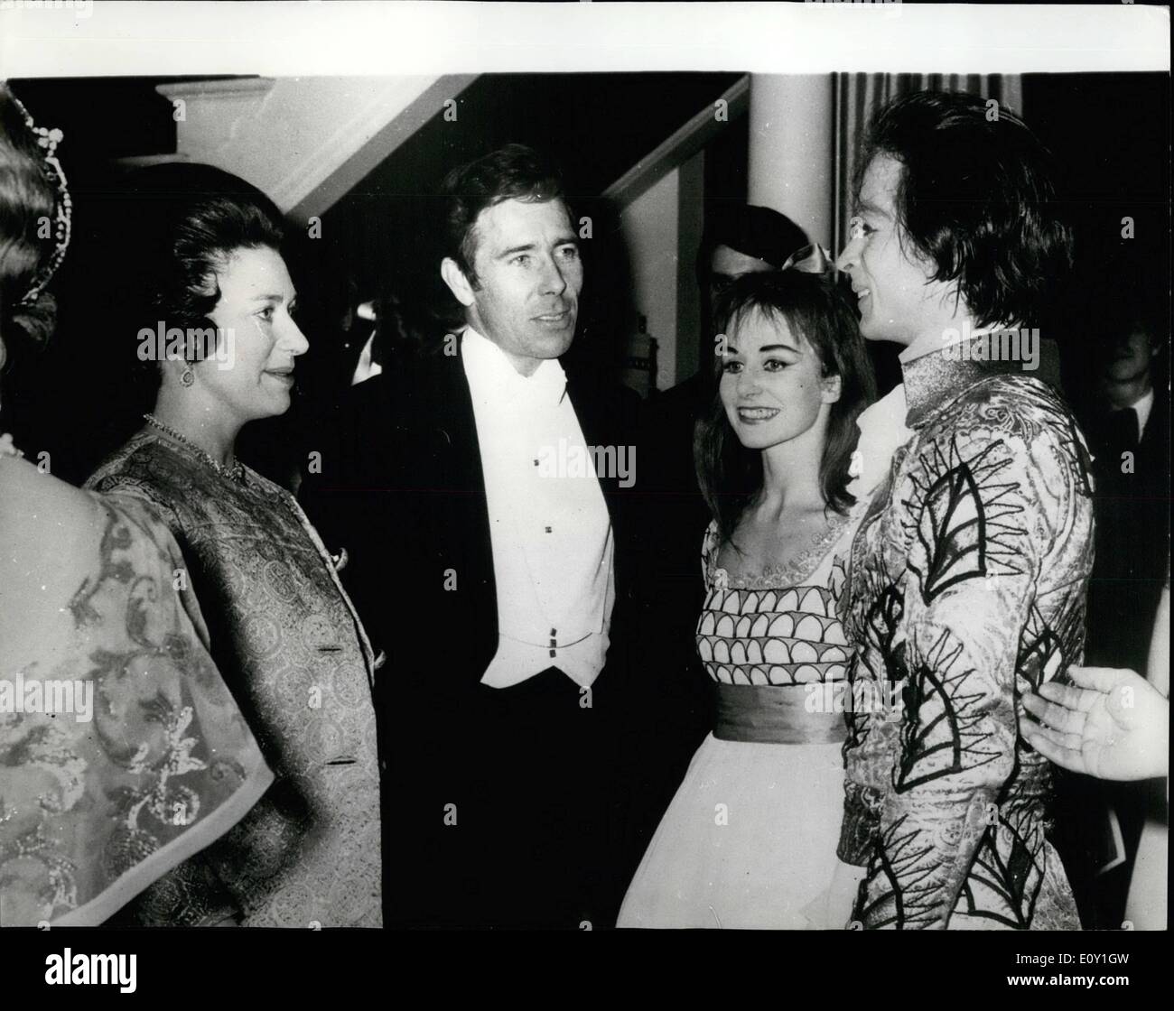 Mar. 03, 1968 - Prince Charles And Princess Anne See ''The Nutcracker'': Prince Charles and Princess Anne made their first official visit to the the Royal Opera House, Covent Garden, last night, for the gala performance of Rudolf Nureyev's production of ''The Nutcracker''. The Queen Mother took them and Princess Margaret and Lord Snowdon. Photo shows Princess Margaret and Lord Snowdon talking to Rudolf Nureyev and Ballerina Merle Park, after last night's gala performance. Stock Photo