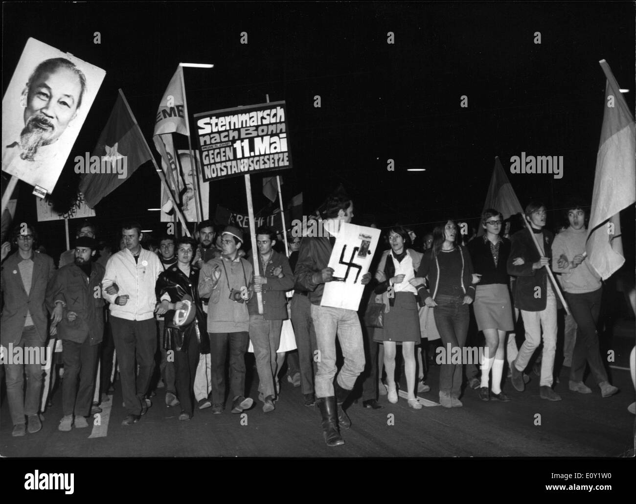 May 09, 1968 - Ms Tschi Minh and No end: From the US barracks in Munich to the University went a protest procession of the ''beside parliament-opposition'' which demanded a comment with paroles against the war in Vietnam and against any dictatorship. In spite of the currently increasing number of demonstrators no incidents happened. Photo Shows Demonstration procession of the ''beside-parliament-opposition'' with the usual transparencies. Stock Photo