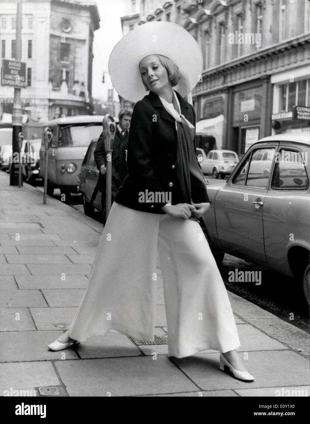 May 13, 1968 - Genevieve Waite has fitting for her clothes for Cannes. Genevieve Waite, star of the new film ''Joanna'' which will be shown at Cannes Film Festival next Wednesday, May 15th, went along to Chirsitian Dior-London, Conduit St, today for a last fitting before flying to Cannes. Genevieve Waite has chosen a number of evening and day clothes for her stay in Cannes, among which are the Jewelled shorts. with see-through blouse for evening, and dungarees and Matelot look for day - in fact the highlight's of the Christian Dior - London Spring/Summer Collection designed by Jorn Langberg Stock Photo