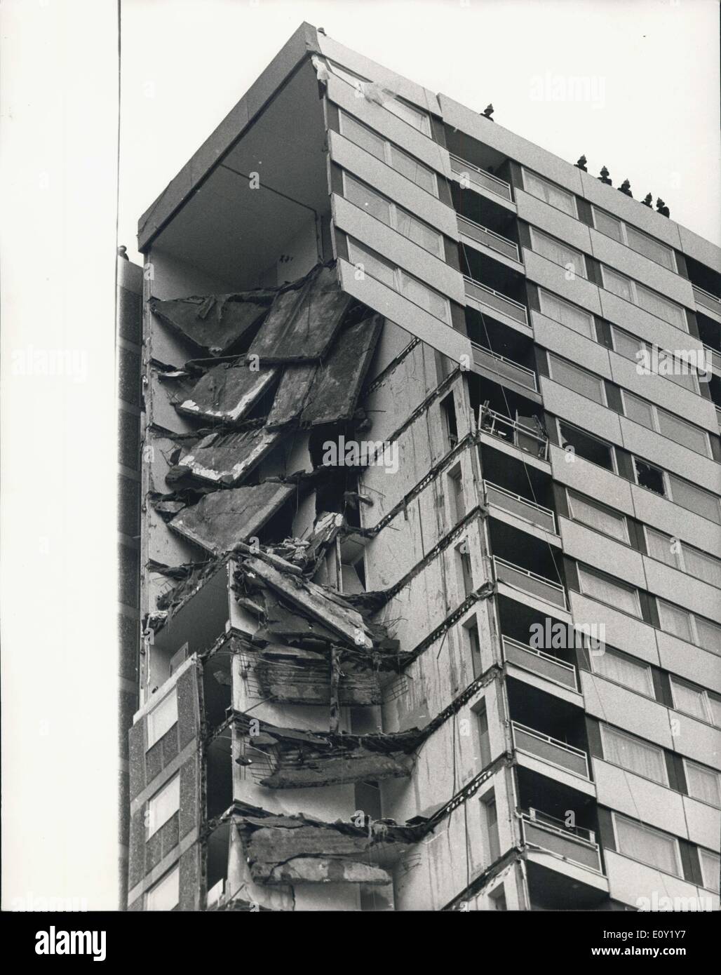May 16, 1968 - Fifteen Feared Dead And 80 Trapped When Part of Block of Flats Collapses. 15 people are feared dead and 80 trapped in East London today, when part of a 23-storey block of flats collapsed today. Teams of police ad firemen searched the rubble in Butcher's Road, Canning Town. Reports said there had been an explosion just before the collapse of the south-east corner of the building. Keystone Photo Shows:- View showing part of the collapsed section of the block of flats. Stock Photo