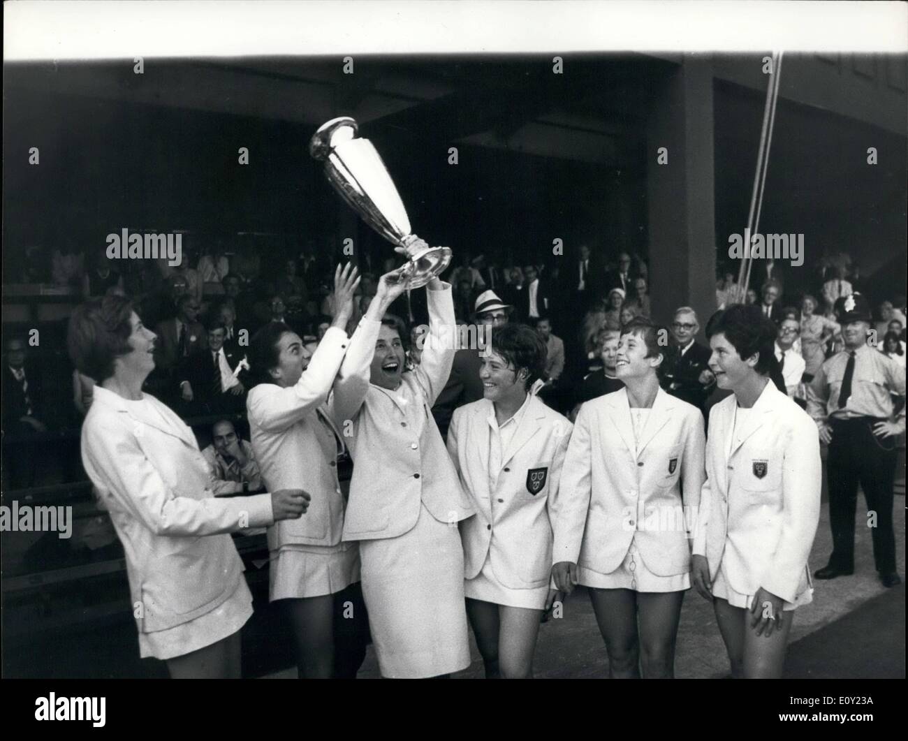 Jun. 06, 1968 - Britain win the wightman cup for the first time since 1960 - Truman Sisters save the Day. Yesterday evening, almost in semi- darkness, Mrs. Christine Janes, and her sister Nell Truman, beat the American pair, kathy Harter and Stephanie de Fina, 6-3, 2-6, in the deciding game in the doubles match to win the Wightman Cup 4-3 at Wimbledon. Photo Shows Mrs. Angela Barrett, the Captain, almost drops the Wightman Cup in her excitement, as she holds it aloft for all to see as she poses with the victorious British team. ( L. to r. ) Mrs Stock Photo