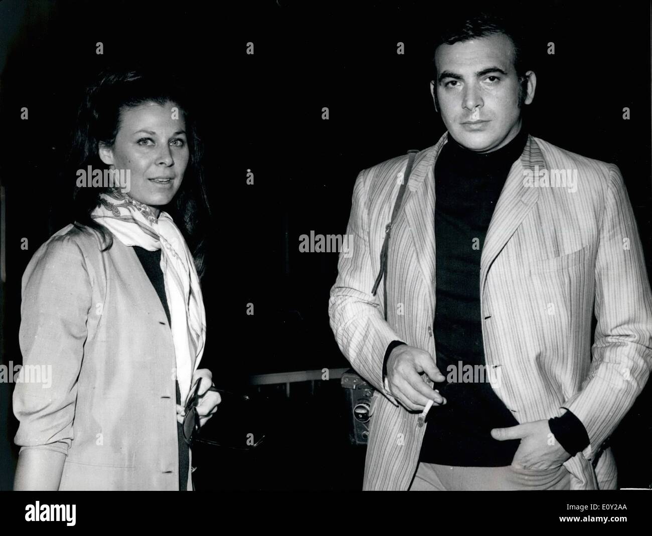 Jun. 06, 1968 - Italian actor Maurizio Arena , who was the protagonist of the love story with the Princess Beatrice of Savoy, departed for Buenos Ayres accompanied by his new fiancee Dafne Dayne who resembles in extraordinary was to the Princess Beatrice, Maurizio Arena and Dafne are working in a film that counts the story of the ''romantic love'' between the Princess and the actor. Photo shows Maurizio Arena and Daphne Dayne ad the depart for Buenos Ayres. Stock Photo