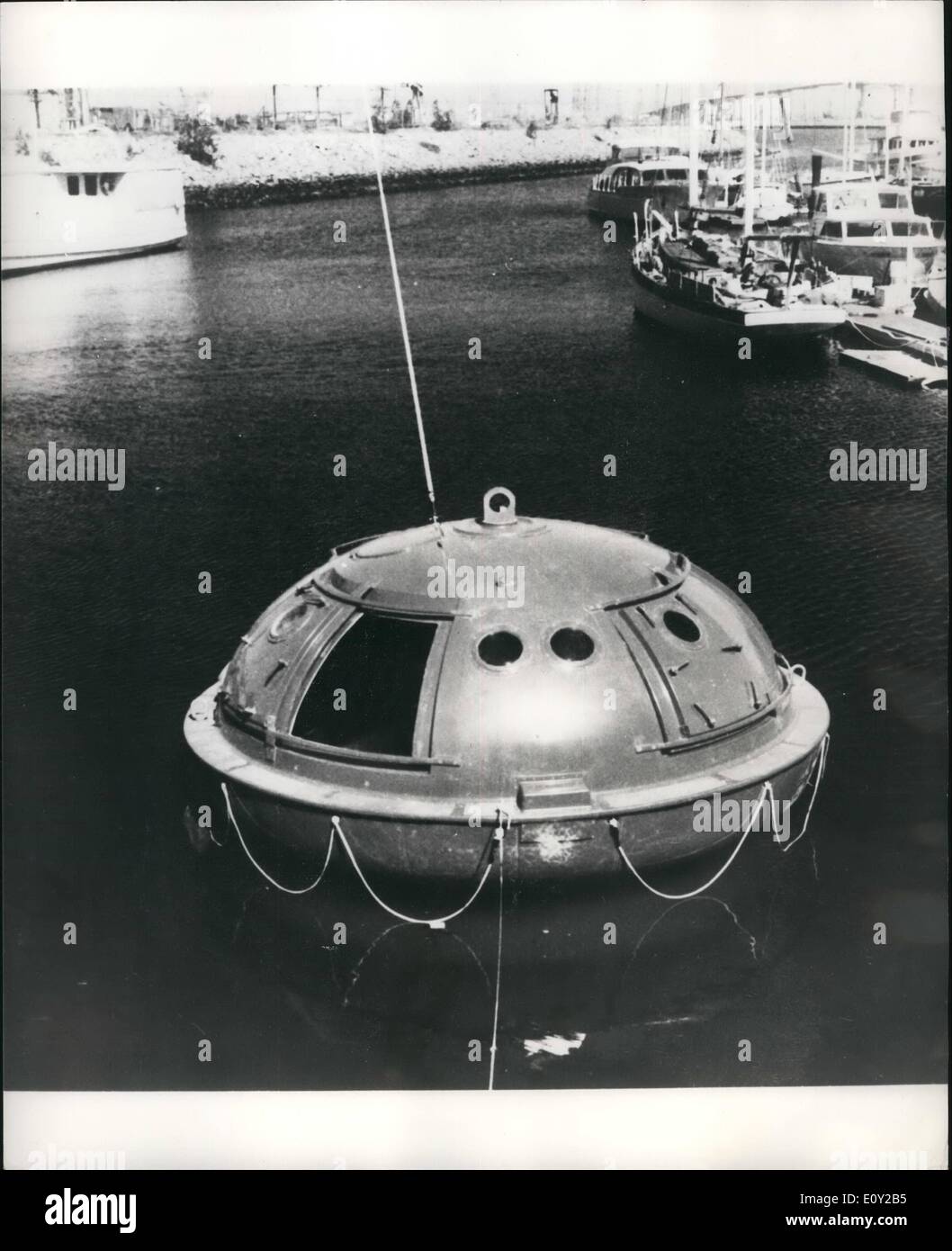 Jun. 06, 1968 - THE BRUCKER SURVIVAL CAPSULE - A MAJOR ADVANCE IN SAFETY AT SEA: The Brucker Survival Capsule is a new departure in the protection of life at sea, conceived to fulfill its mission from the moment of disaster until rescue of its occupants. The 14-feet diameter, lenticular-shaped capsule is fabricated of a fire-retardent fibreglass, impregnated with a radar reflective material, and has a steel centre column for added strength Stock Photo