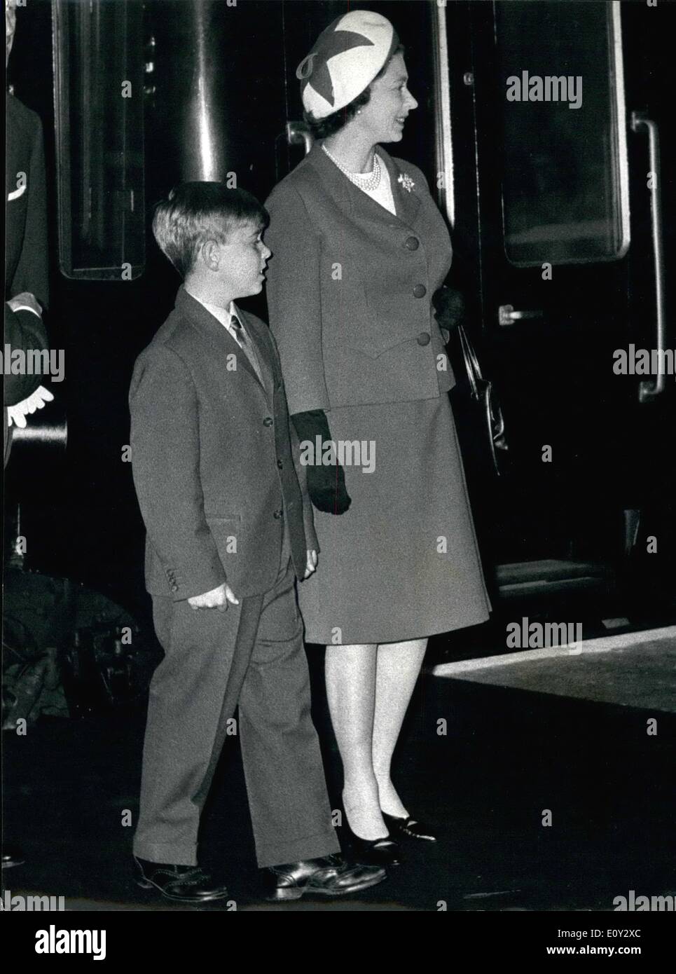 Sep. 09, 1968 - Royals arrive in London. Prince Andrew's first long Trouser suit.: The Queen and the Duke of Ediburgh who interrupted their Balmoral holiday to take eight-year-old Prince Andrew to join Heatherdown preparatory school, Ascot, as a boarder, arrived at King's Cross Station this morning. Photo shows H.M. The Queen and Prince Andrew wearing his first suit with long trousers on arrival at King's Cross Station today. Stock Photo