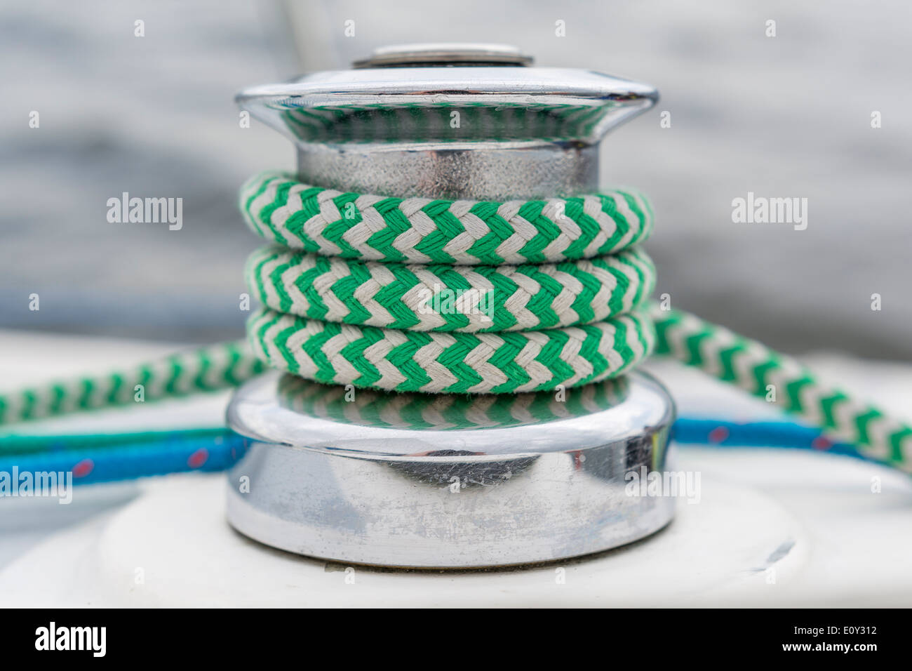 Sail yacht - winch, green and blue rope Stock Photo