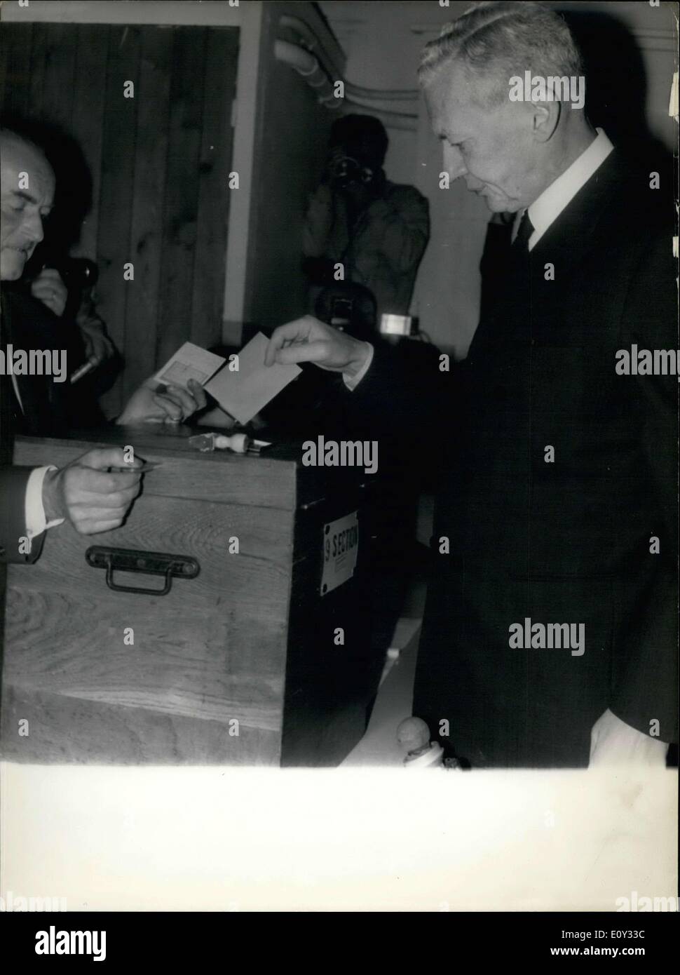 Jun. 23, 1968 - Many of the French chose to leave this weekend before casting their votes, but not Couve de Murville, who is seen here casting his ballot. Stock Photo