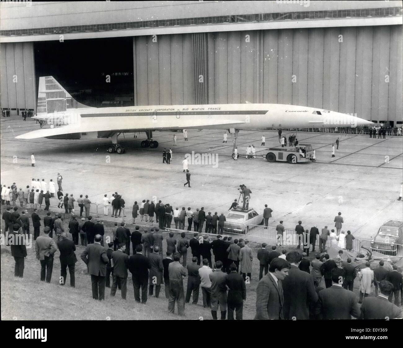 Sep. 09, 1968 - Concorde CO2 Rolls out of its hangar; There was no ceremony today when Concorde CO2, the second prototype of the Angle-French supersonic airliner, was rolled out of its hangar at the British Aircraft Corporation factory, Filton, near Bristol, watched by several thousand workers who helped build her. It was towed across Filton airfield to an engine testing base. Photo Shows General view of the scene when Concorde CO2 prototype was rolled out of its hangar at the British Aircraft Corporation factory at Bristol, today. Stock Photo