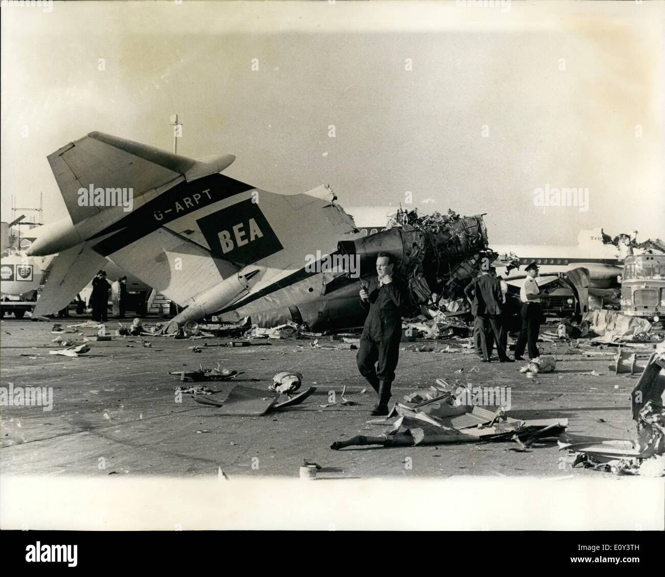 Jul. 07, 1968 - Six people die in air crash; Six people were killed and six injured as an Elizabethan freighter of BKS the independent airline, crashed on landing at Heathrow Airport yesterday. Struck three parked BEa airliners and smashed into the wall of a passenger building under construction. The crashed plane was returning eight brood mares and fosils from Deauville, France. to study farms in the South of England. The plane;s crow of three and three grooms on board died. All the hoses were killed or had to be destroyed Stock Photo