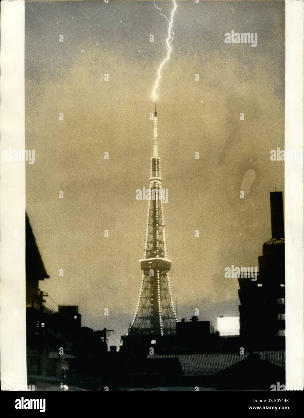 Jul. 07, 1968 - Tokyo Tower Struck By Lighting [Remarkable Picture By Professional Golfer: This unusual picture showing ;lighting striking the very top of Tokyo Tower -the tallest tower in the World - was taken during a recent by Mr. Liem Fords, Chief golf professional at the Kanagawa Country Club in Japan, from a friend's apartment near the tower. He set his camera up when he storm started and gave 1/4 second expouser at 1:1.8, with a 55mm lens, and using a cable release, Mr. Forde, an Irishman born at Bray, Stock Photo