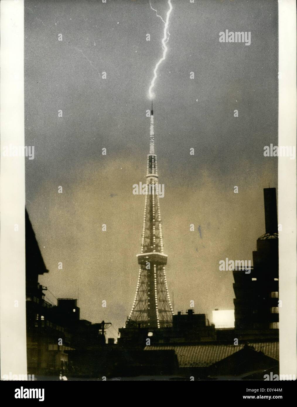 Jul. 07, 1968 - Tokyo Tower Struck By Lighting Remarkable Picture By Professional Golfer: This unusual picture showing ;lighting striking the very top of Tokyo Tower -the tallest tower in the World - was taken during a recent by Mr. Liem Fords, Chief golf professional at the Kanagawa Country Club in Japan, from a friend's apartment near the tower. He set his camera up when he storm started and gave 1/4 second expouser at 1:1.8, with a 55mm lens, and using a cable release, Mr. Forde, an Irishman born at Bray, Stock Photo