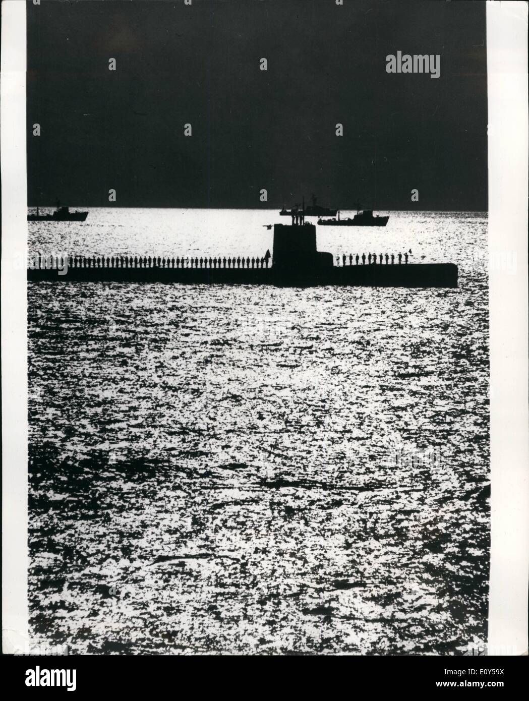 Nov. 11, 1968 - A study in black and white, Japan's new Navy; Ships, submarine and naval air support took part in a review of Japan's maritime self defense forces in Tokyo Bay as Prime Minister Eisaku Sato watched the re-born naval forces and 7,000 men in their various craft from the 5,050 ton flagship Akatsuki. The force is review comprised 43 surface ships, 3 submarines, and 47 planes. Photo Shows One of Japan's submarines with her crew in dress ship order, is silhoustted by the sunshine in Tokyo Bay during the naval review. Stock Photo
