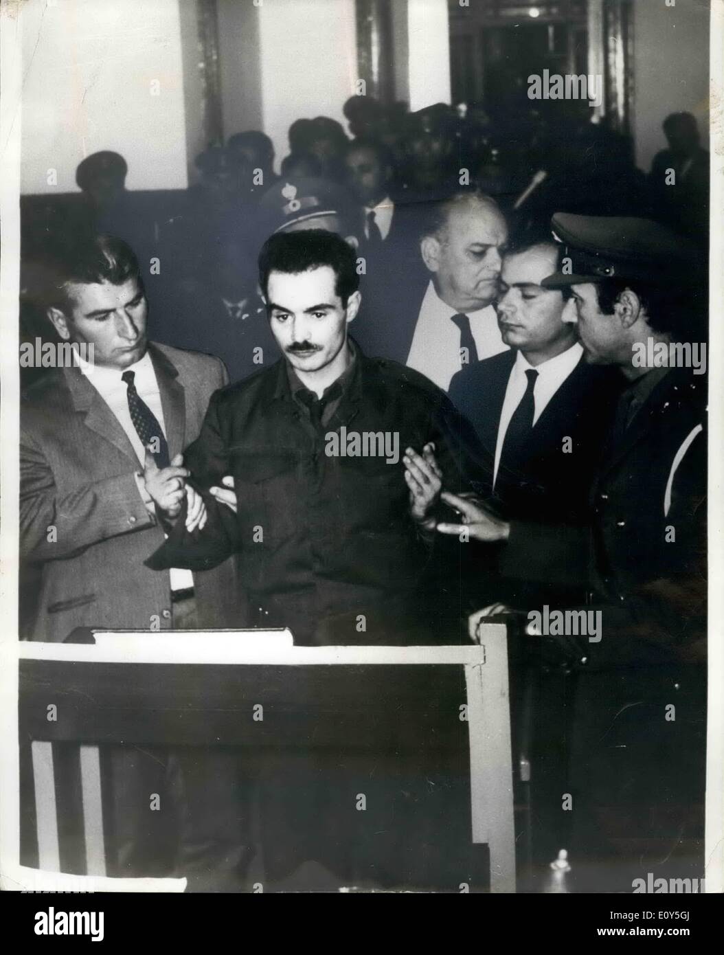 Nov. 11, 1968 - 15 On Bomb PLT Charges In Athens: Alexandros Paragoulis, accused of being the leader of a plot to assassinate Mr. Papadopoulos, the Greek Prime Minister, told a court martial, which opened in Athens on Nov. 4, that he had been tortured ''on the lines of the Spanish Inquisition'' during 82 days detention. On trial with Panagoulis, were 14 youths said to have helped him in the abortive bomb attempt on Aug. 13 Stock Photo