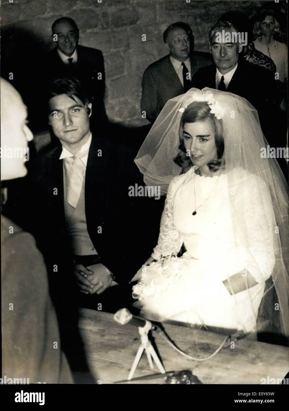 Mar. 03, 1969 - Famous Swimmer Weds: Danielle Dorleans, one of the top French girl swimmers, was married to Jacques Dimont, Fencing Champion, Olympic gold medal. In Marseilles yesterday. Her Twin sister, Monique, was married at the Same time to Francois Jeanne, member of the Fencing team. photo shows Danielle Dorleans and Jacques Dimont Pictured during the civil wedding atmarseilles yesterday Stock Photo