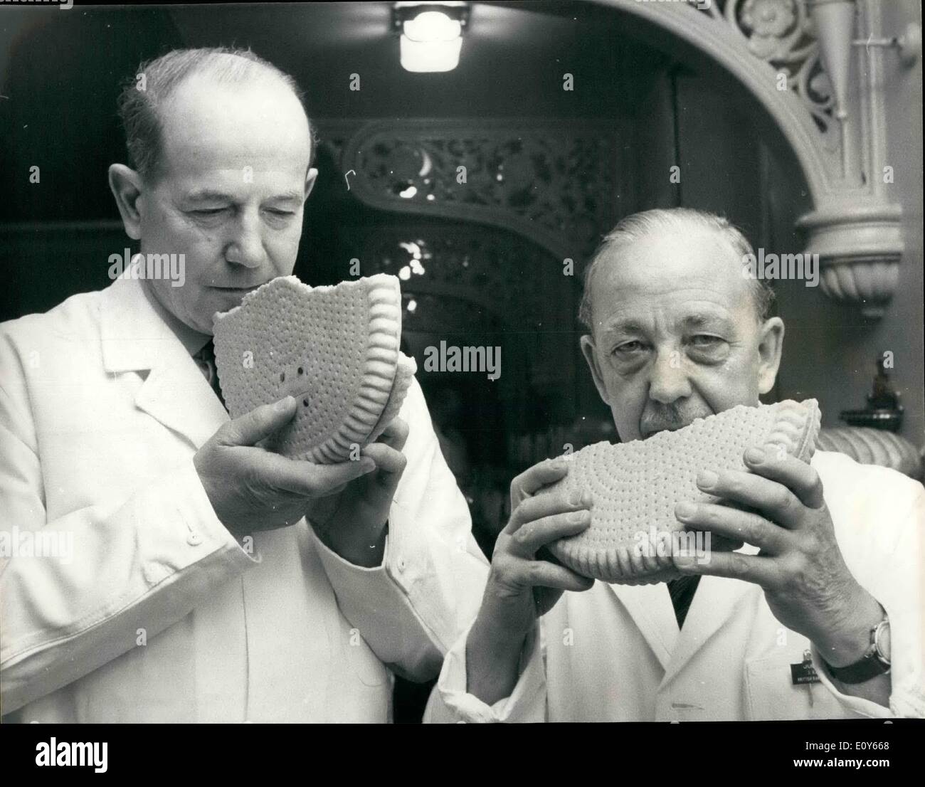 Mar. 03, 1969 - Bread and Confectionery Competition at Caxton Hall. Picture Shows: Mr. A, Goodfellow (left), from Dundee, and Mr. J. Kenneth, from Ayr, smelling Scottish Shortcake, during judging at Caxton Hall today in the annual bread and Confectionery competition. Stock Photo