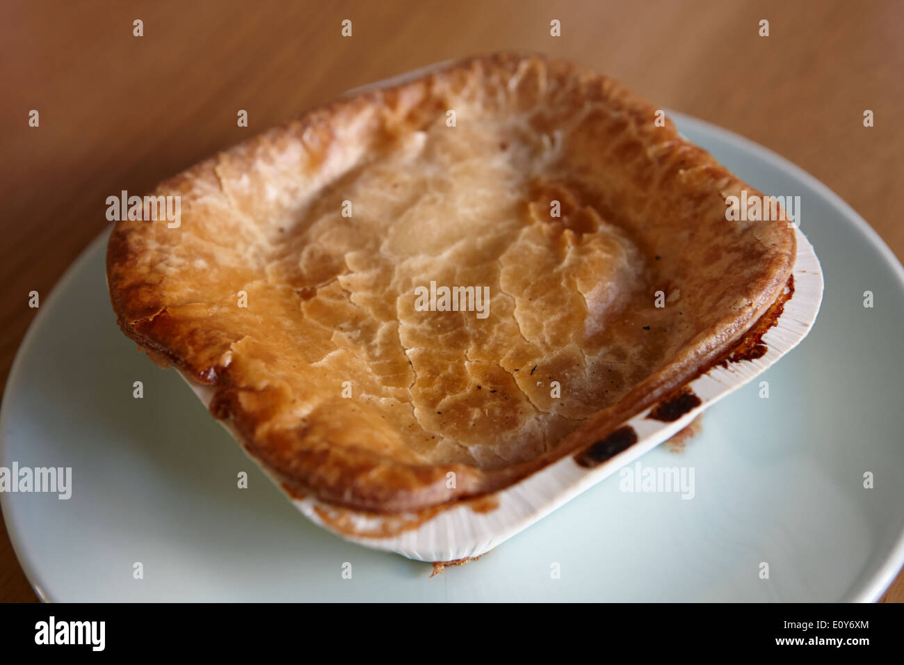 baked scouse pie in carton Stock Photo