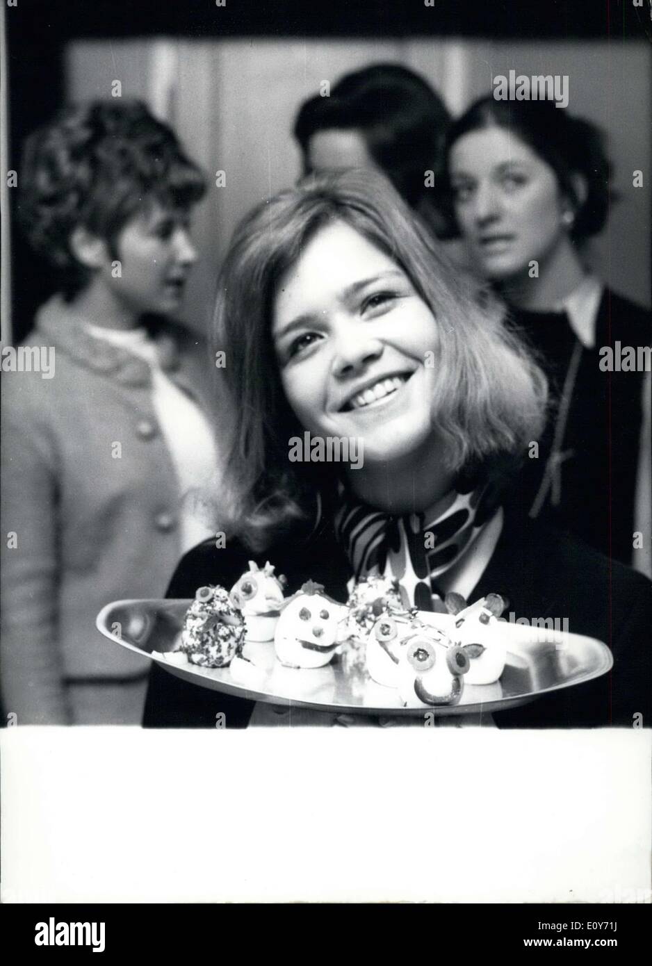 Mar. 15, 1969 - This student from the International Housekeeping College has a confection that is both tasty and ''pleasant to look at.'' Edda Meyer-Berkhout is the leader of the institute, which gives a solid foundation for a ''housewife-like'' education. One learns to be a good hostess among other things. These little confections were made for Easter. Stock Photo