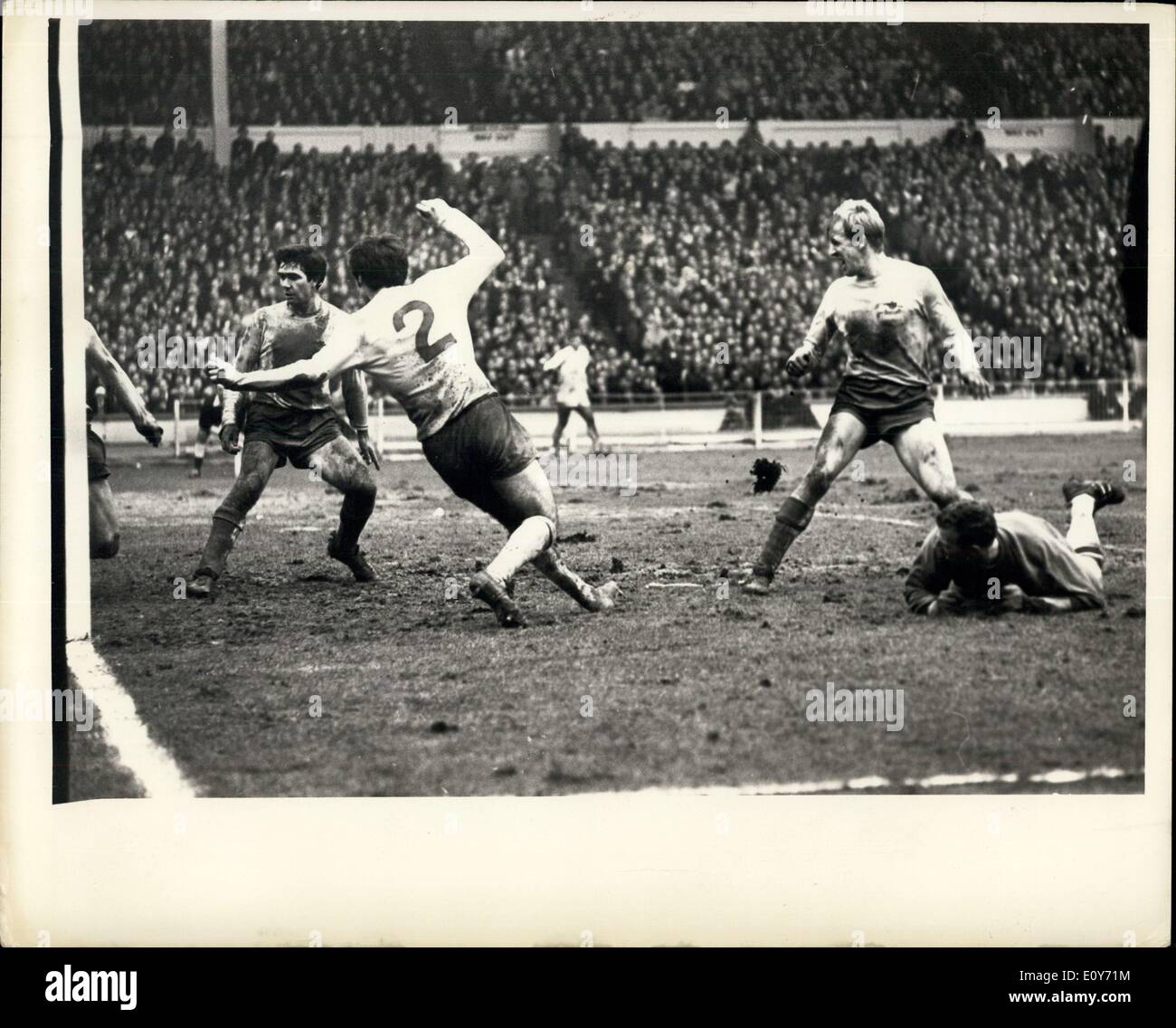 Mar. 16, 1969 - The Goal That Cracked Arsenal: Four Arsenal players watch helplessly as the bail hit by Swindon Town';s Don Rogers (unshown) enters the net, in the league Cup final match at Wembley, London, March 15. Photo Shows Bobby Gould; Peter Storey; Ian Ure and Goalie Bob Wilson (on ground). It was Swindon's Town's Second goal scored in the extra times, after Bobby Gould goal few minuted before the end had forced the match into extra this. Swindon town won 3-1. Stock Photo