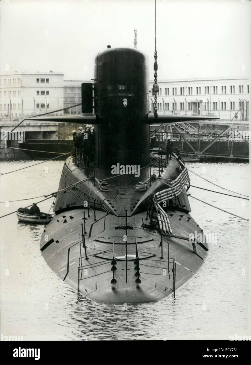Mar. 20, 1969 - The first nuclear submarine, the ''Redoutable'' is 128 meters long, 10.60 meters wide, and deplaces 8,000 tons of water on the surface and 9,000 tons of water underneath the surface. It travels at 20-25 knots produced by a nuclear motor with power around 20,000 CV. It can travel at anywhere from 300 meter depths to 500 meter depths. It should be in working service by the end of 1971, give or take a year. Picture: The nuclear submarine ''Redoutable'' afloat in Cherbourg's port. Stock Photo
