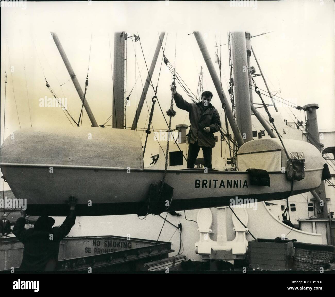 Jan. 01, 1969 - Single handed Rower Get Ready To Row The Atlantic The 22 foot wooden boat ''Britannia'' which John Fairfax, is going to row single handed across the Atlantic, was loaded aboard the Royal Mail Lines ''Aragon''. The boat, designed by Uffa Fox, the famous boat builder, to start it journey to Las Palmas, in the Canary Islands, from where Mr. Fairfax will begin his 3,500 mile row to Miami, Florida. He will be the first person to attempt to row single handed across the Atlantic. The journey he anticipates will take about three months. Photo Shows:- Mr Stock Photo