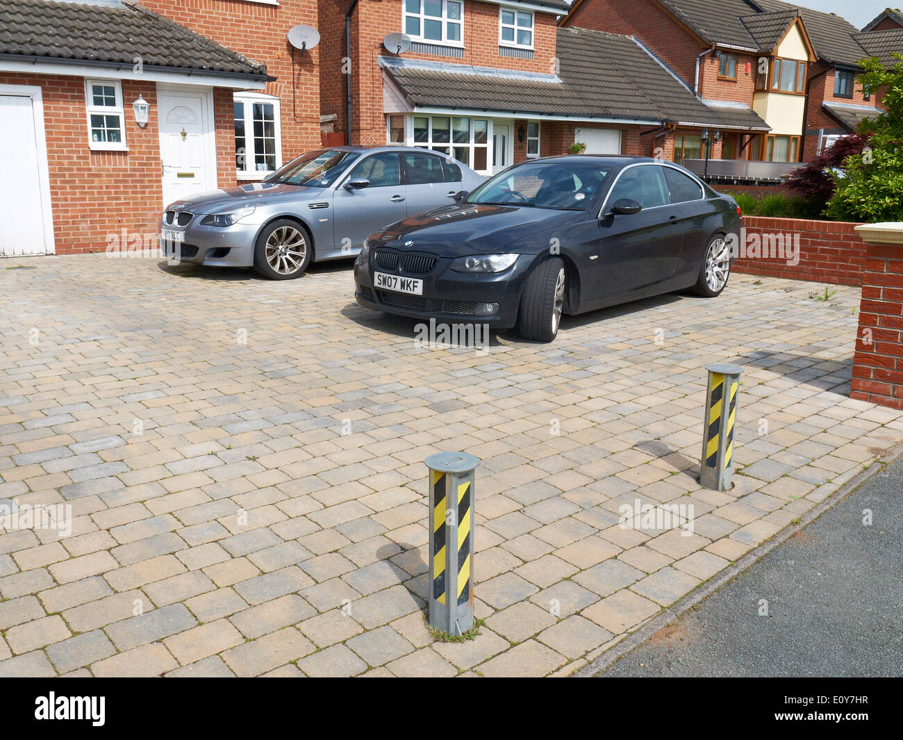 Raised bollards on private estate in Cheshire UK Stock Photo