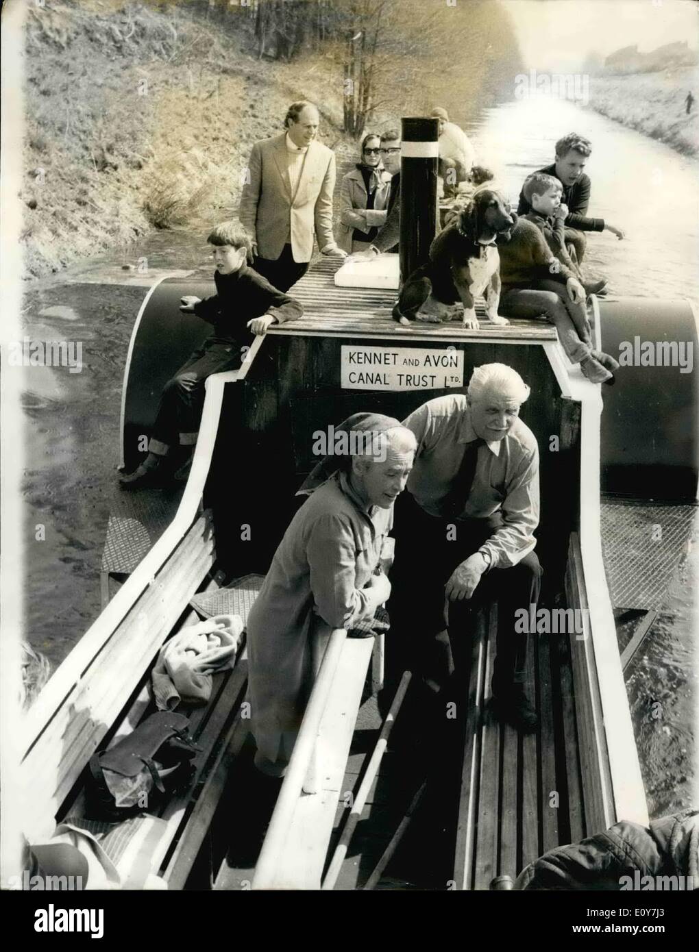 Apr. 04, 1969 - Paddle Boat Brings Hope for Canal.: Gen. Sir Hugh Stockwell, commander of the Allied land forces in the 1956 Suez operation, successfully launch a new campaign when steered the six-ton paddle boat Charlotte Dundas on her maiden passenger voyage along the Kennet ang Avon canal at Devizes, Wilt, yesterday. ''This voyage means that the canal can be made to work,'' said Sir Hugh, who is chairman of the Canal Trust. The Trust see yesterday's 30-minute trip, made at a comfortable two miles an hour, as a major step towards opening up the canal for public pleasure craft Stock Photo