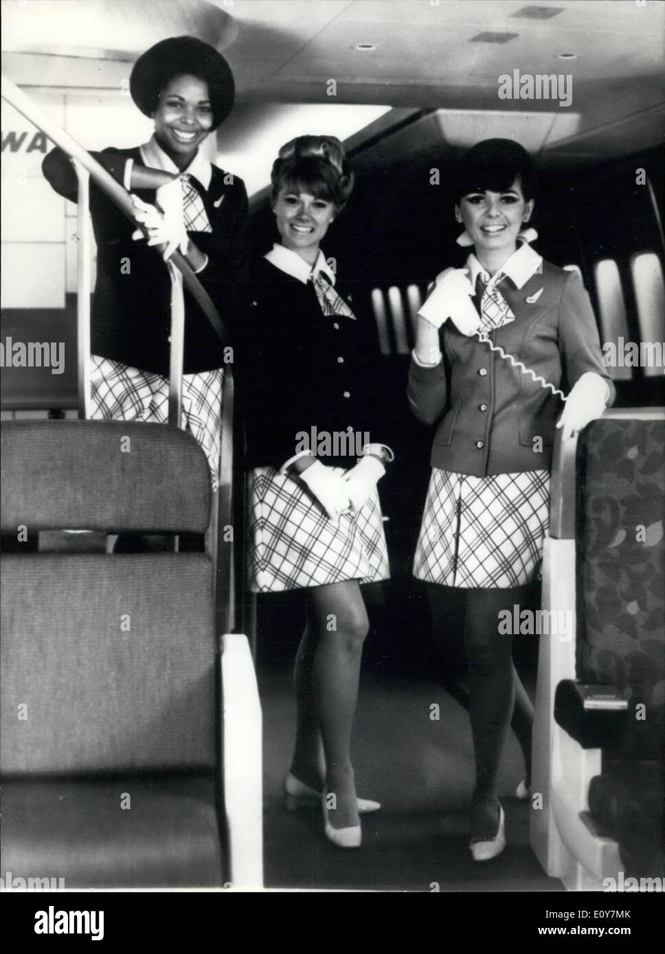 Apr. 04, 1969 - Summer Uniforms Or T.W.A. Hostesses: Photo shows. three charming T.W.A. hostesses displaying the new summer uniform on board the first Boeing 747. Stock Photo