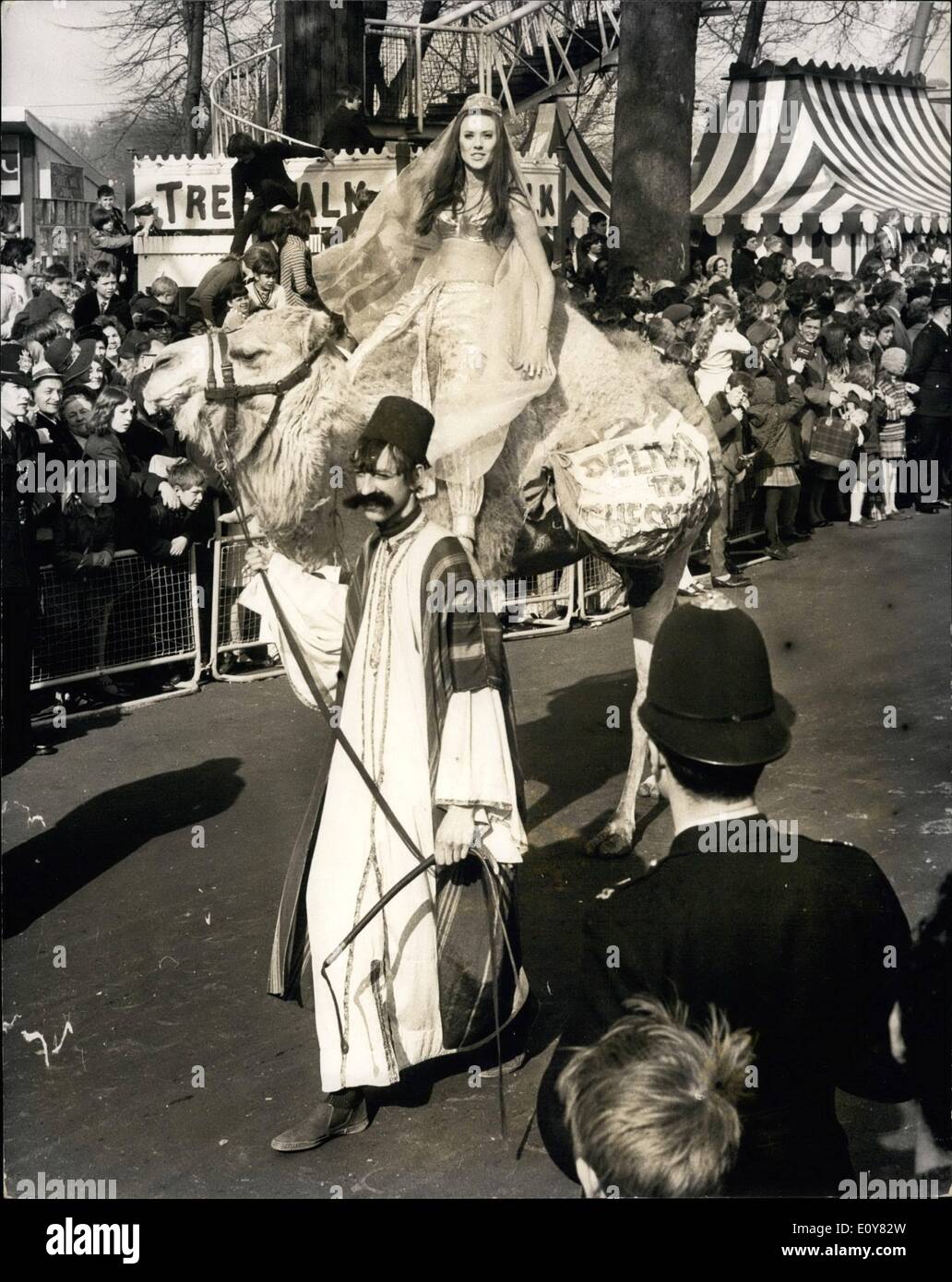 Apr. 04, 1969 - 2000 years of Transport on show at London's Easter Parade: ''Cavalcade of Transport'', was the them of this year's annual Easter parade held today in Battersea park. Photo Shows One of the varied entries depicting all forms of motivation was this camel with its charming passenger during today's parade. Stock Photo