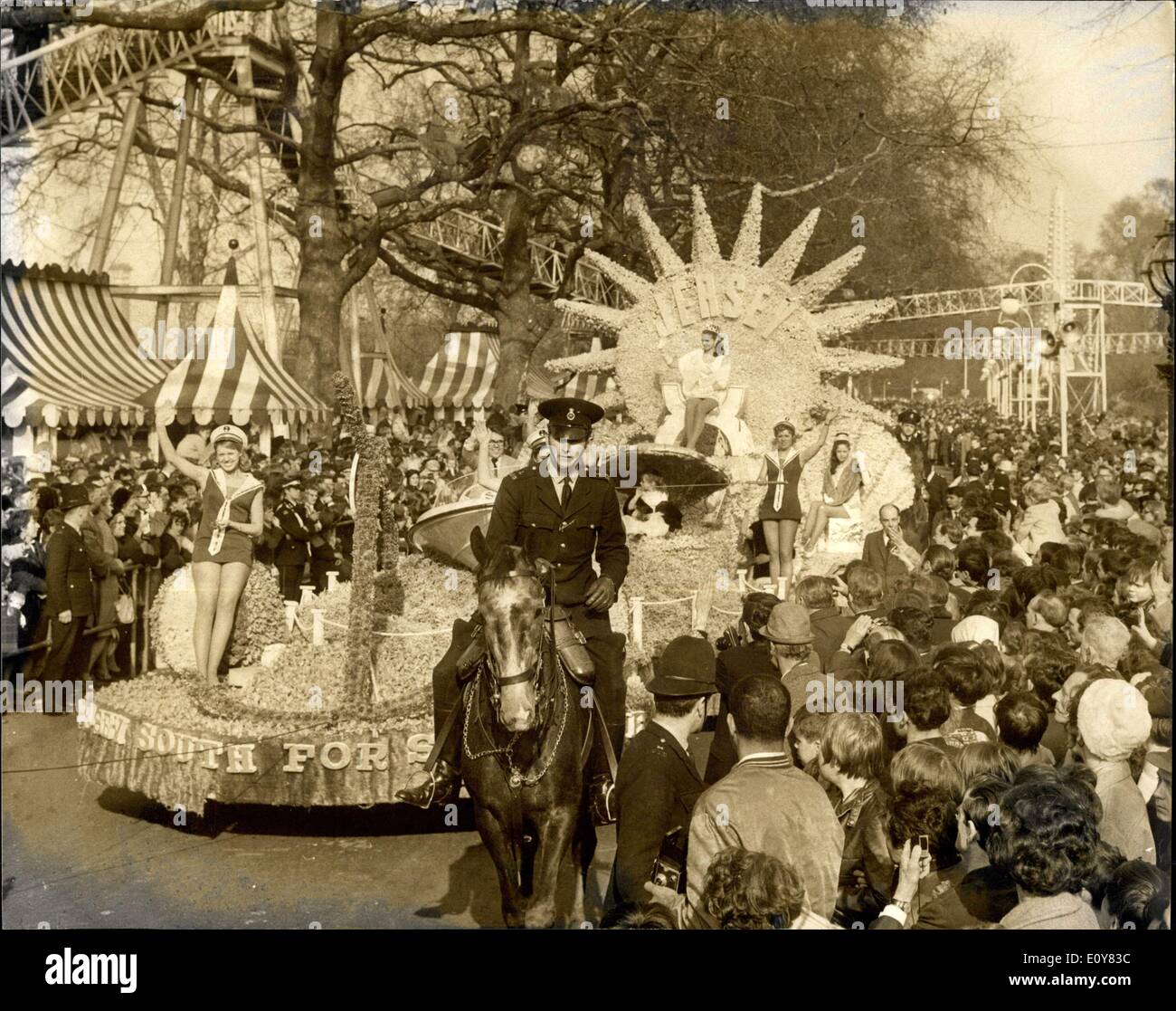 Apr. 06, 1969 - 2000 years of transport on show at London?s Easter Parade ? ?Cavalcade of Transport? was the theme of this year?s annual Easter Parade held today in Battersea Park. A magnificent floral float carried London?s Easter Princess and her Maids of Honour. Photo Shows: Christine Hasler, London?s Easter Princess, and her four Maids of Honour, on the magnificent floral float during the parade. Stock Photo