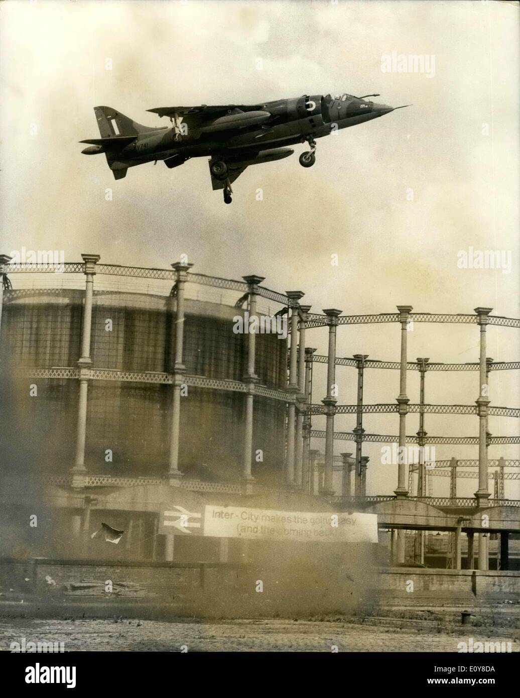 May 03, 1969 - R.A.F. Makes first Ever Landing In London with Fix- Wing Jet: The First landing in the heart of London by a fixed -wing jet aircraft was made today when a Royal air Force Harrier GRI landed vertically on a specially prepared ''pad'' at at Somers Town high, in St. Pancras. The Hawker Siddeley ''Jump-jet'' Harrier, piloted by Squadron -Leader Tom Lecky- Thompson, 34, of Salisbury, Wilts, Landed at comers Town High, a discussed coal-yard near St Stock Photo