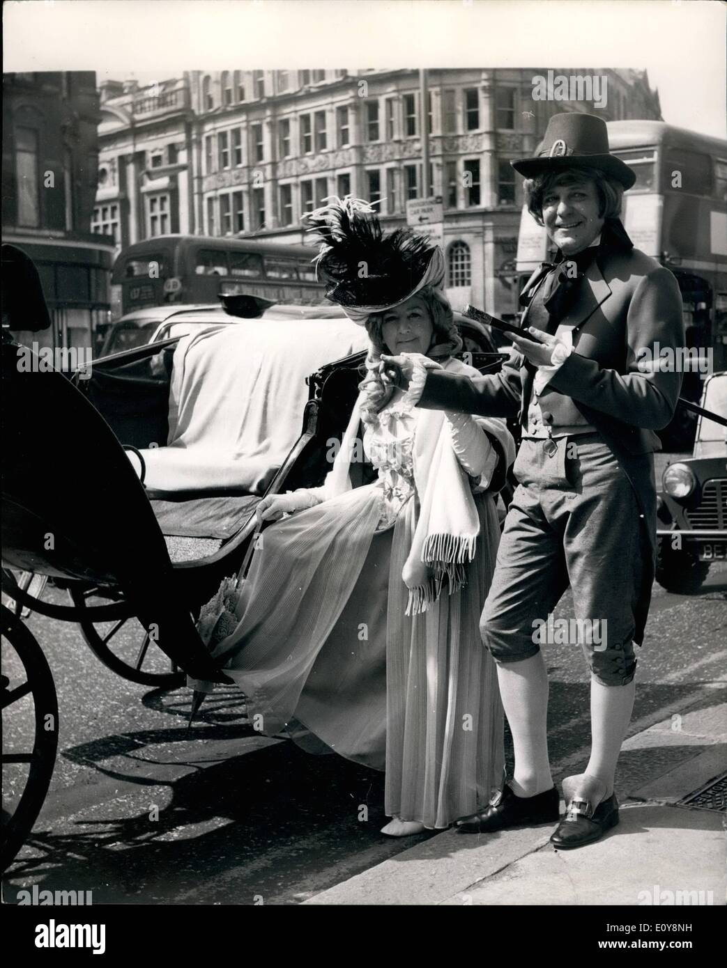 May 05, 1969 - 150th, ANNIVERSARY OF BURLINGTON ARCADE, Some of the colour and ;style of Regency London was recaptured today when ''The Duke and Duchees of KnightebriOW in costume of the period, drove in an open horse-drawl landau from Knightsbridge to the Burlington Arcade, After being received at the Hyde Park Hotel where the, were entertained by Mt. Wilbraham, the hotel manager, they left the hotel and the landau followed the route taken by titled ladies of Knightsbridge Village in 1819 when going Stock Photo