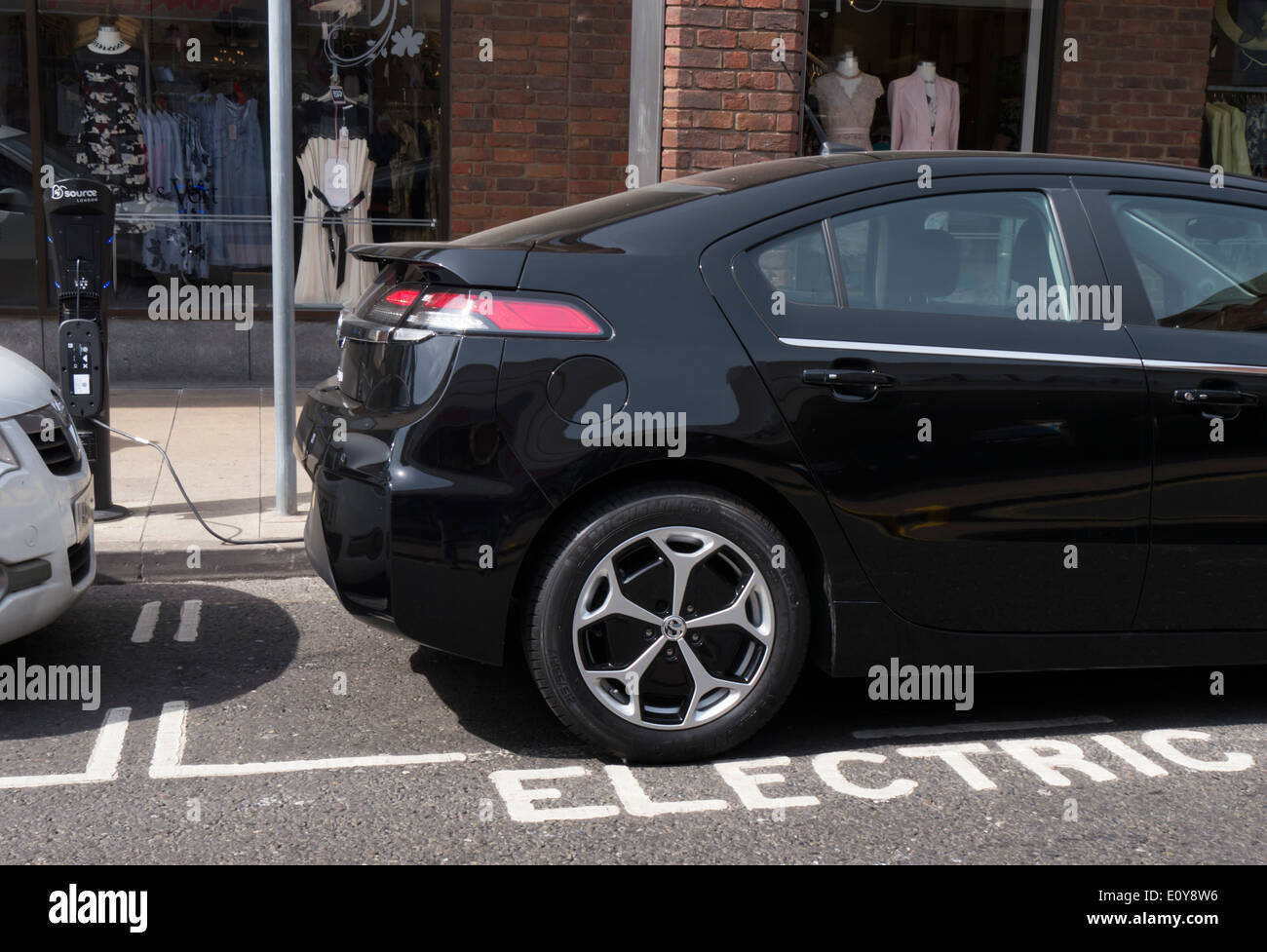 Europe, UK, England, London, electric car black recharging Stock Photo