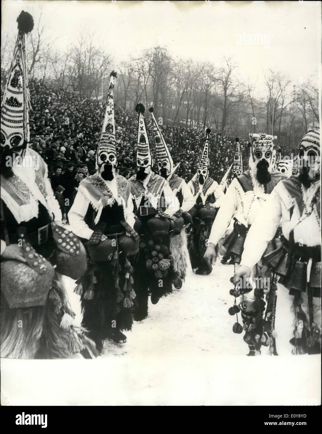 Feb. 02, 1969 - Folklore Festival Of Mummers In Bulgaria. The Third Folklore Festival of Mummers was held in the town of Pernik, Bulgaria. The mummer games emerged in the remote primitiveness of the Old Bulgarians. They were intended symbolically to inspire fear and terror in the ''evil forces'' threatening the farmer and his labour throughout the year, to chase away diseases, beasts of prey, hail - storms, droughts and crop failures so that there may be abundant harvests, good health, happiness and progress in everything. Photo shows scene during the colorful Folklore Festival of Mummers. Stock Photo