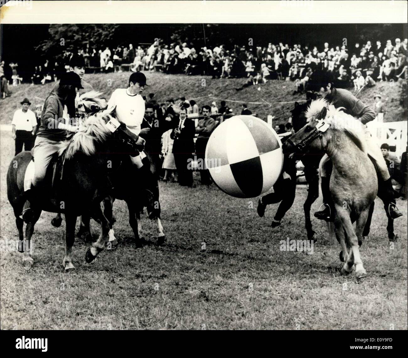 Jun. 06, 1969 - International Hoofball Match - A Perfect head-pass by a Swiss pony to a colleague, during the international hoofball match between Switerland and Holland, which ended in a 3-3 draw. In this game, six ponies and riders take part with a huge, light ball, and the main rule is that the riders do not touch the ball with their feet - and that only the ponies head or legs are used to send the ball goalwards. The Match took place in the german Dangenstett Stock Photo