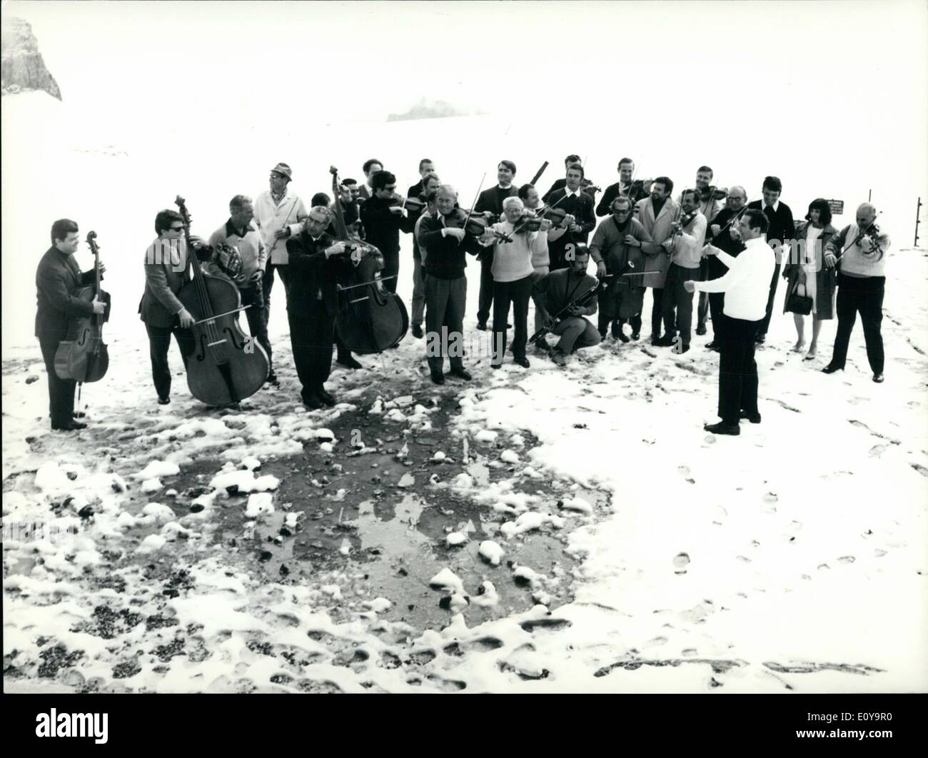 Sep. 09, 1969 - A Symphny on the Glacier: In the frame of the international Musical Festival of Montreux, the Orchestra of the Radio Monte Ceneri performed a very special and spectacular concert: On the glacier of Les Diablerets, about 9,000 feet above the sea-level/, midst in the coolish snow and ice these musicians played differenct symphonical oeuvres under the conduction of M.Rene Klopfenstein. Stock Photo