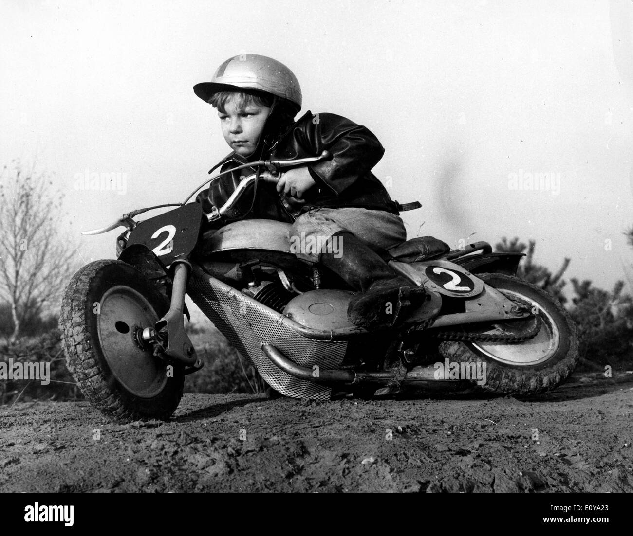 Jun 18, 1969; Surrey, UK; The dare devil, KEIR DOE, five year old speed ace, on the motor-bike which his father built him. Stock Photo