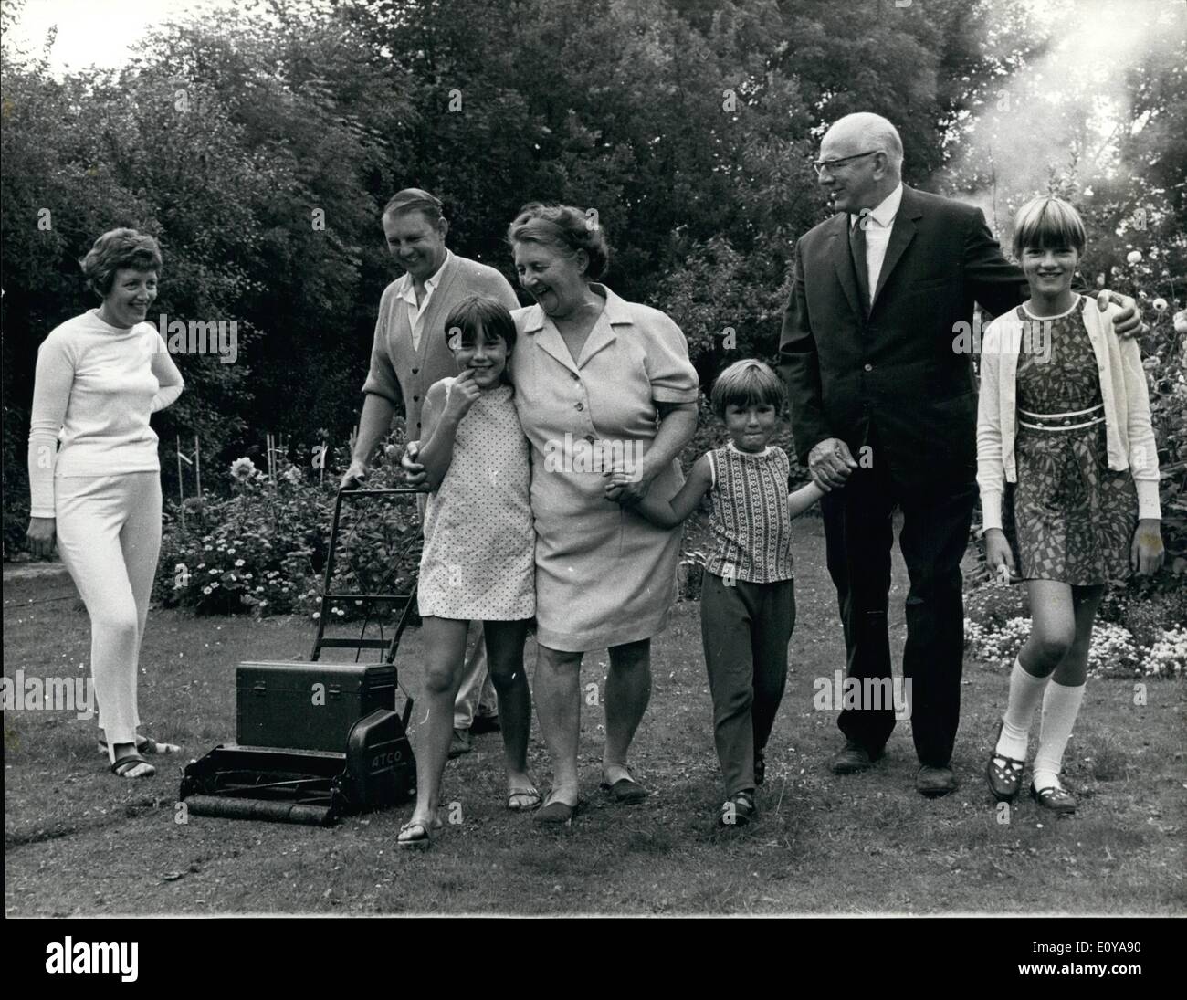 Sep. 09, 1969 - COUSINS' SON WILL CARRY ON UNION CRUSADE, On the eve of his retirement after eleven years as general secretary of the Transport and General Workers' Union, MR. FRANK COUSINS, 65, today, spent a quiet day with his wife, NANCE, in the garden of their home in Carshalton Beeches, Surrey. There was, however, a ''representative&deg; from the union to see of the JUDITH, 5, and JILL, 10.It prosiest, to be an aotive retirement, Mt. Cousins will continue as Chairman of the newly-formed ColMrani-ty-Riastions Commiseion. Stock Photo
