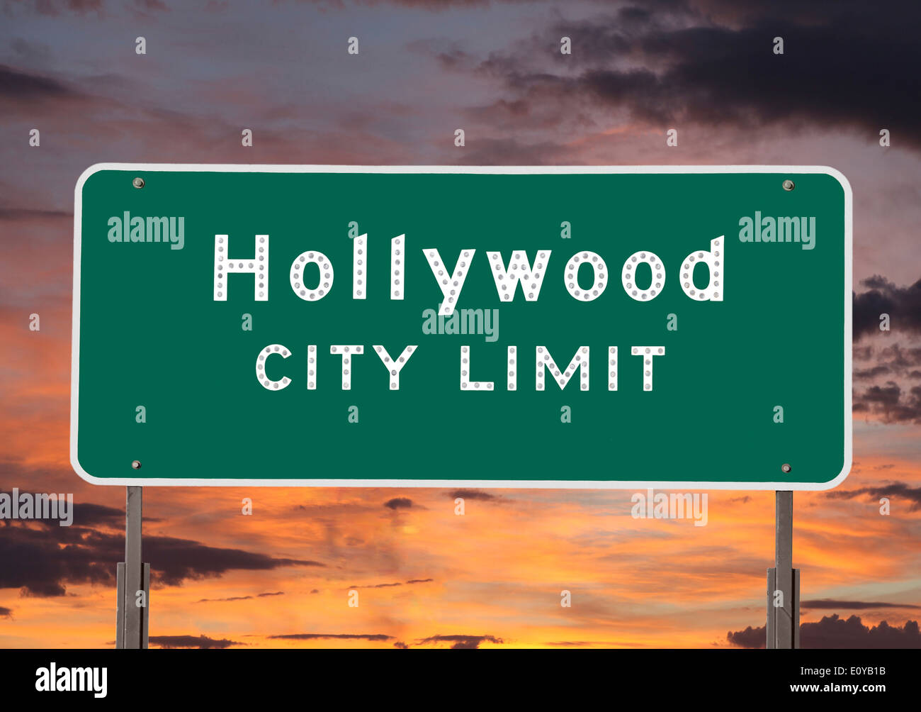 Hollywood city limits sign with sunset sky Stock Photo Alamy