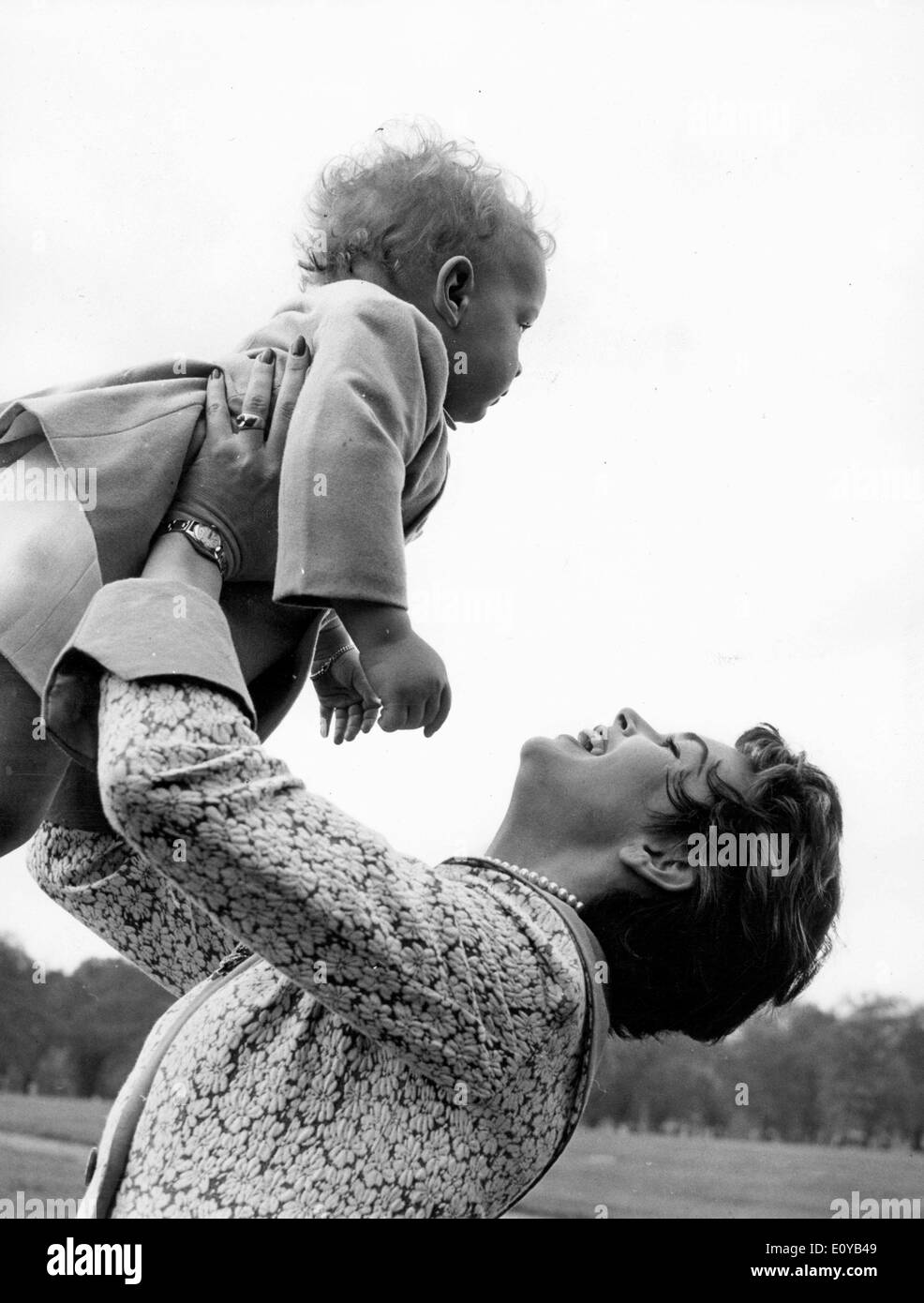 Actress Dawn Addams holding son Stefano Massimo Stock Photo