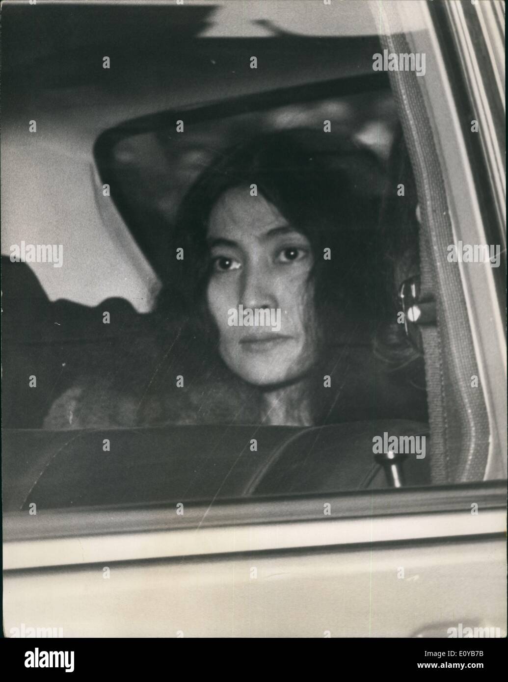 Oct. 10, 1969 - Beatle John Lennon on Drug Charge : John Lennon of the Beatles, and his friend Yoko Ono Cox, the Japanese actress were arrested by Scotland yard Burg Squad officers in London yesterday The were bath charged in two counta the illegal posssal of cannabis and obstructing police in the execution of a search warrant. They were each bailed on the sum of &pound;100 for themselves and n surety of &pound;100 and will appear at Marylebone court today. Three detectives and a police women celled at a ground floor flat in montage square, Marylebone, yesterday Stock Photo