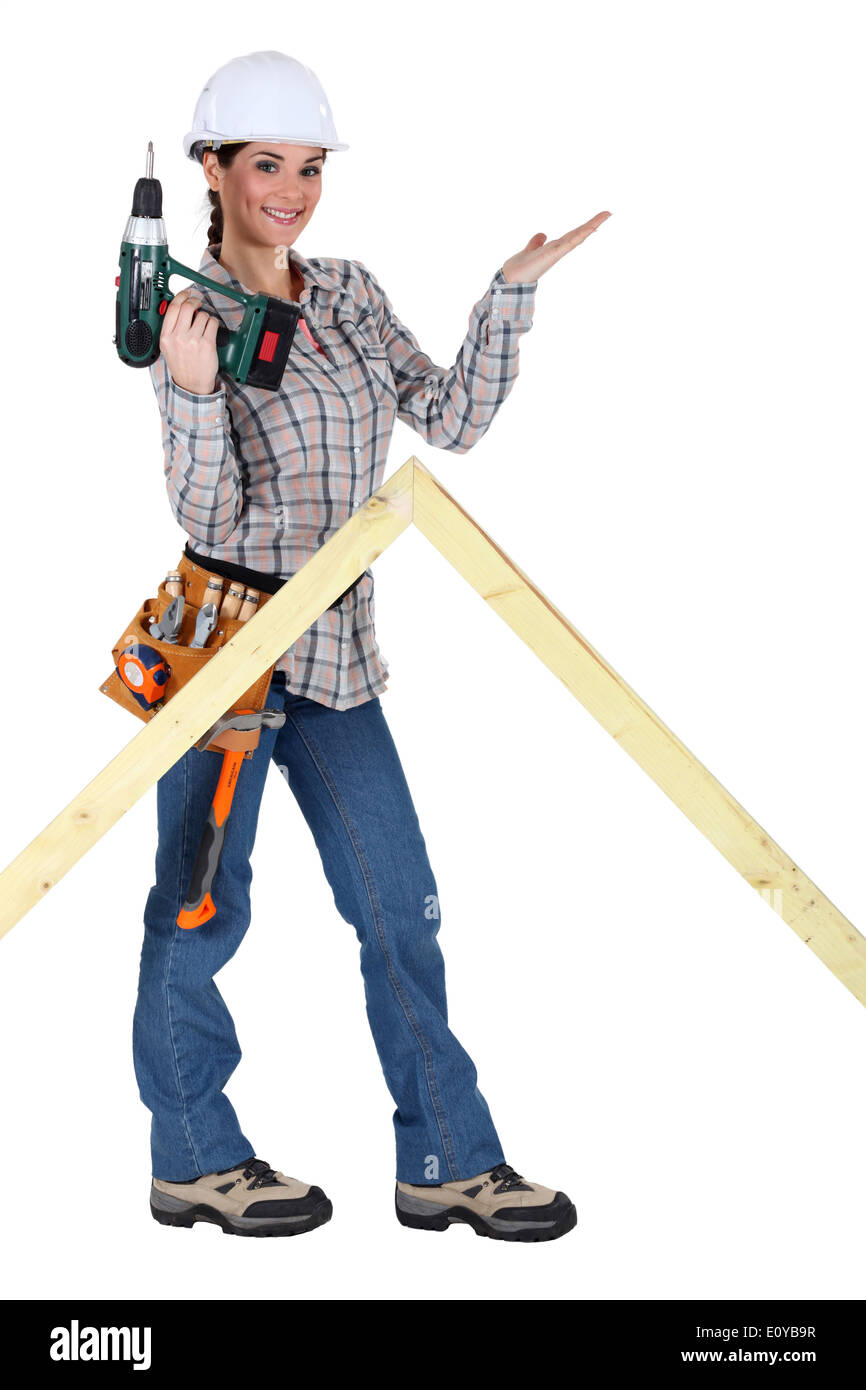 Woman with drill Stock Photo